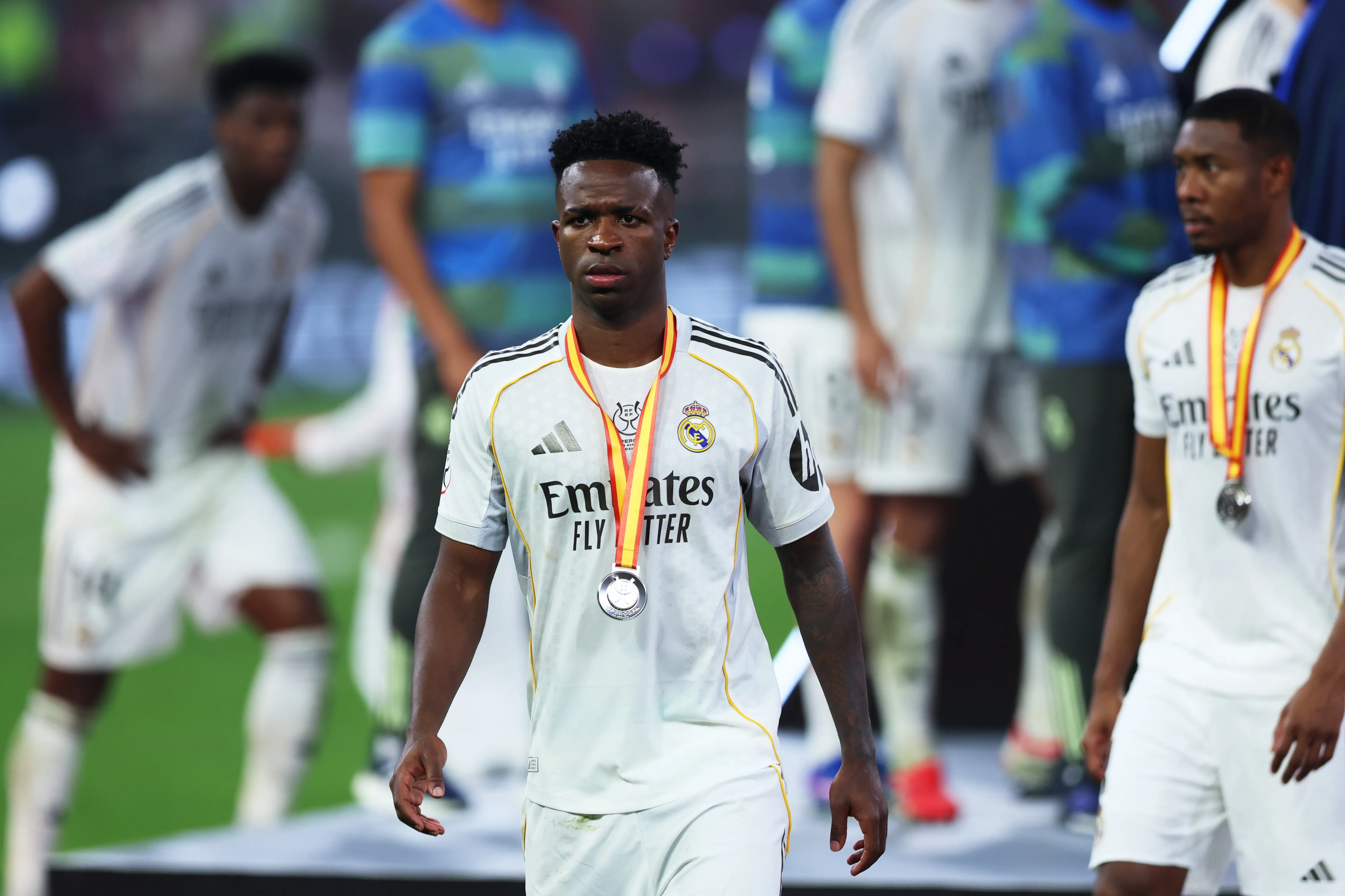 JEDDAH, SAUDI ARABIA – JANUARY 11: Vinicius Junior of Real Madrid is pictured with their runners up medal following the Spanish Super Cup Final between FC Barcelona and Real Madrid at King Abdullah Sports City Hall Stadium on January 11, 2026 in Jeddah, Saudi Arabia. (Photo by Yasser Bakhsh/Getty Images)