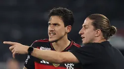 Filipe Luís ao lado de Pedro.