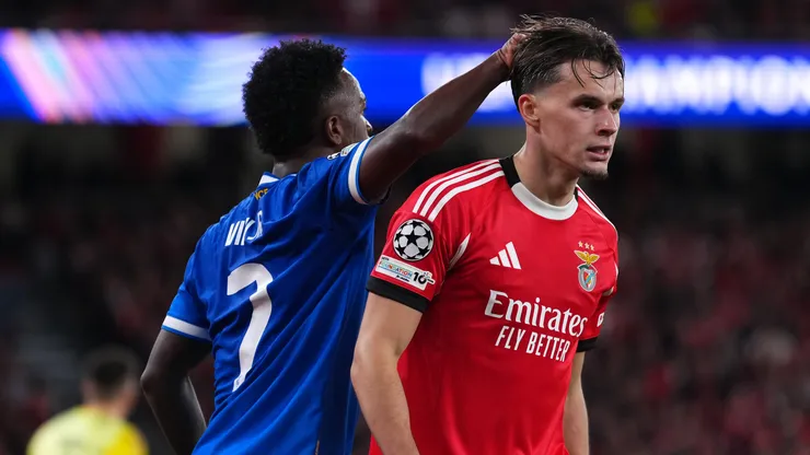 LISBON, PORTUGAL - FEBRUARY 17: Amar Dedic of Benfica reacts towards Vinicius Junior of Real Madrid during the UEFA Champions League 2025/26 League Knockout Play-off First Leg match between SL Benfica and Real Madrid C.F. at Estadio do SL Benfica on February 17, 2026 in Lisbon, Portugal. (Photo by Angel Martinez/Getty Images)