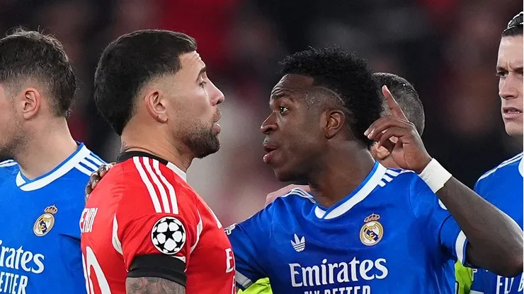 Vinicius Junior of Real Madrid speaks to Nicolas Otamendi of Benfica during the UEFA Champions League 2025/26 League Knockout Play-off First Leg match between SL Benfica and Real Madrid C.F. at Estadio do SL Benfica on February 17, 2026 in Lisbon, Portugal. (Photo by Angel Martinez/Getty Images)