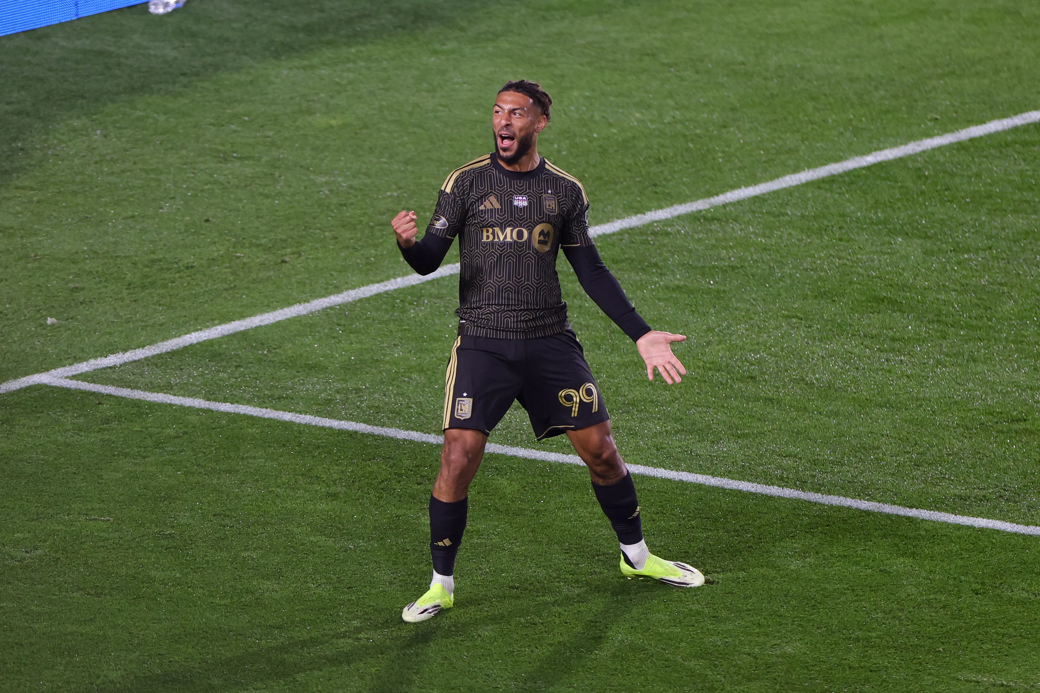LOS ANGELES, CALIFORNIA – FEBRUARY 21: Denis Bouanga #99 of Los Angeles FC celebrates after scoring his team’s second goal during the MLS match between Los Angeles Football Club and Inter Miami CF at Los Angeles Memorial Coliseum on February 21, 2026 in Los Angeles, California. (Photo by Ryan Sirius Sun/Getty Images)