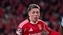 Vinicius Junior of Real Madrid is challenged by Gianluca Prestianni of SL Benfica during the UEFA Champions League 2025/26 League Knockout Play-off First Leg match between SL Benfica and Real Madrid C.F. at Estadio do SL Benfica on February 17, 2026 in Lisbon, Portugal. (Photo by Angel Martinez/Getty Images)