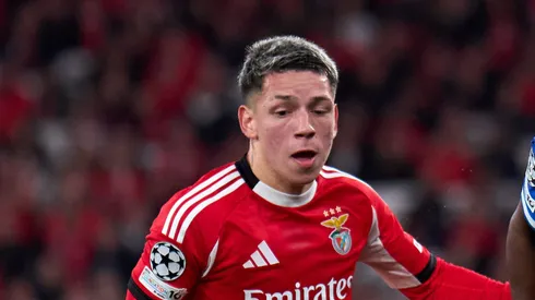 Vinicius Junior of Real Madrid is challenged by Gianluca Prestianni of SL Benfica during the UEFA Champions League 2025/26 League Knockout Play-off First Leg match between SL Benfica and Real Madrid C.F. at Estadio do SL Benfica on February 17, 2026 in Lisbon, Portugal. (Photo by Angel Martinez/Getty Images)