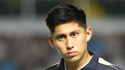 Miguelito em campo com a camisa do Peixe.