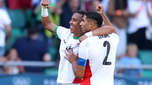 NANTES, FRANCE - AUGUST 08: Soufiane Rahimi #9 of Team Morocco celebrates scoring his team's second goal with teammate Achraf Hakimi #2 during the Men's Bronze Medal match between Egypt and Morocco during the Olympic Games Paris 2024 at Stade de la Beaujoire on August 08, 2024 in Nantes, France. (Photo by Robert Cianflone/Getty Images)