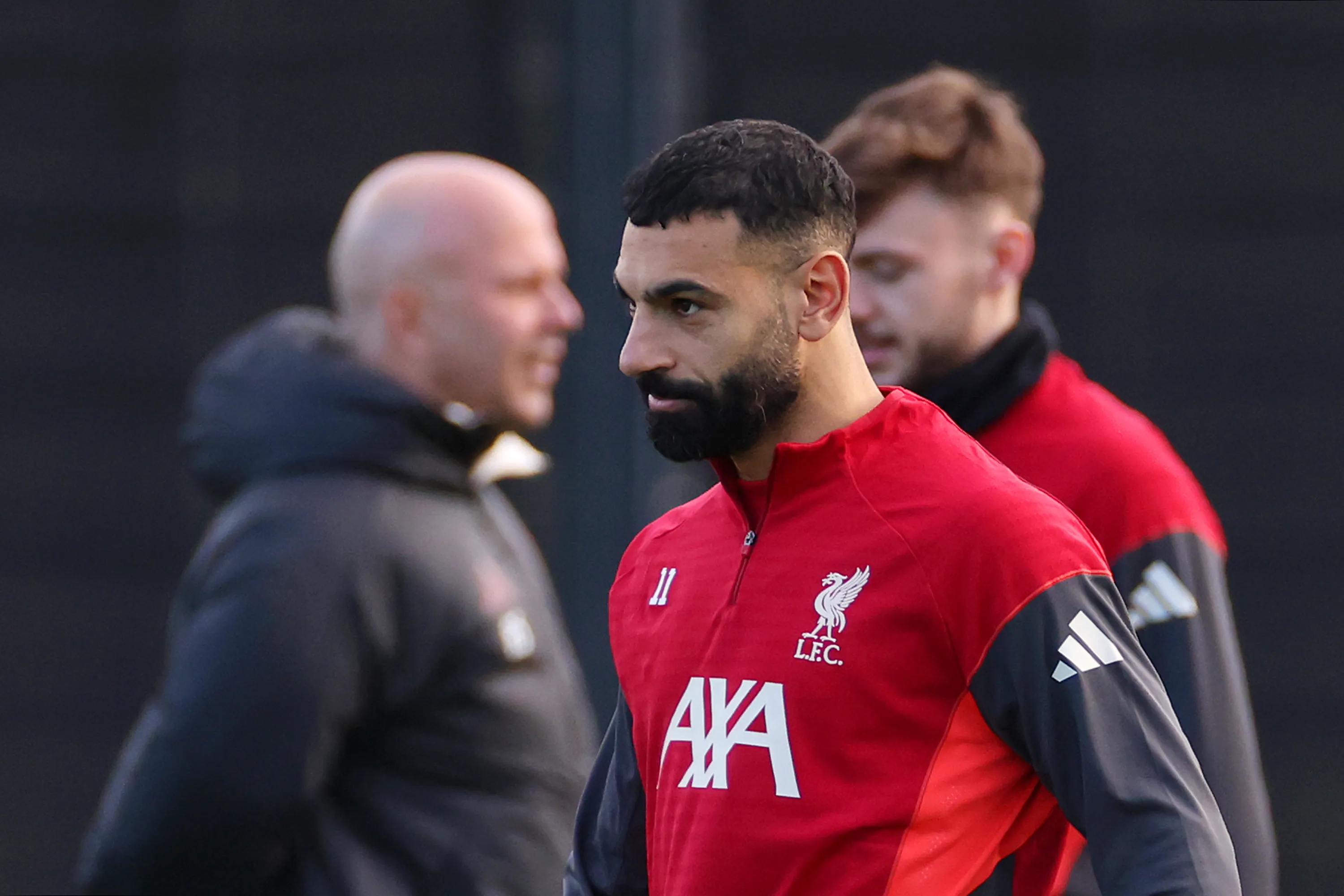 KIRKBY, ENGLAND – DECEMBER 08: Mohamed Salah of Liverpool looks on as Arne Slot, Manager of Liverpool, is seen during a Liverpool Training Session at AXA Training Centre on December 08, 2025 in Kirkby, England.  (Photo by Lewis Storey/Getty Images)