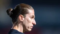 Filipe Luís durante partida do Fla, clube que ele trabalhou anteriormente.