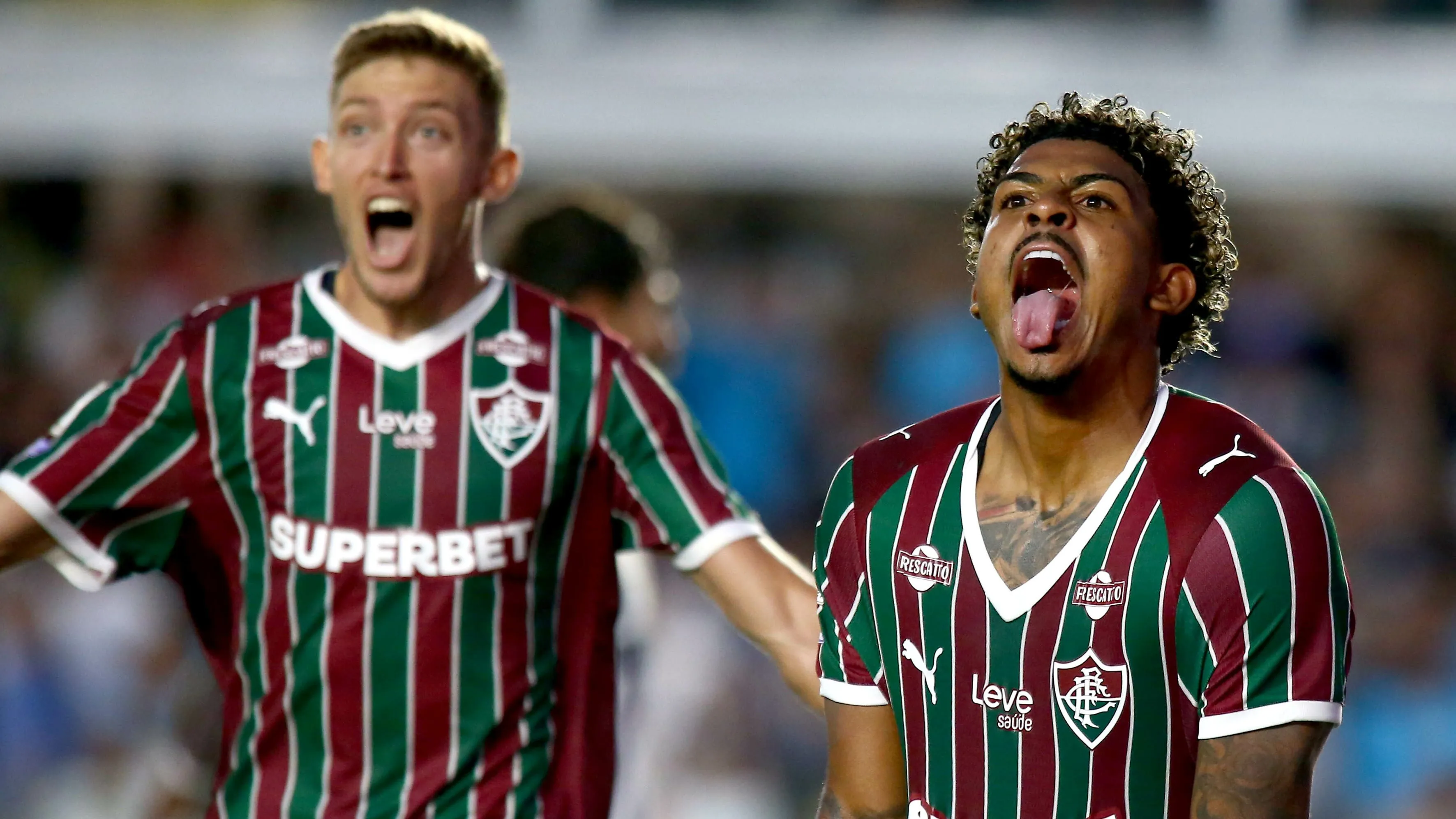 John Kennedy jogador do Fluminense comemora seu gol durante partida contra o Santos no estadio Vila Belmiro pelo campeonato Brasileiro A 2026. Foto: Mauricio De Souza/AGIF