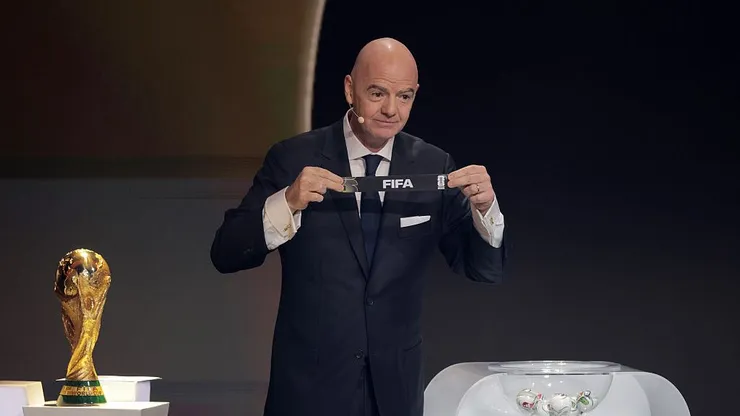 WASHINGTON, DC - DECEMBER 05: Gianni Infantino, President of FIFA, draws out the card of FIFA during the FIFA World Cup 2026 Official Draw at John F. Kennedy Center for the Performing Arts on December 05, 2025 in Washington, DC. (Photo by Kevin Dietsch/Getty Images)