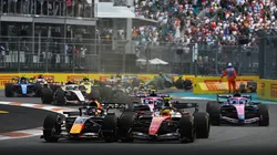 MIAMI, FLORIDA - MAY 02: Max Verstappen of the Netherlands driving the (3) Oracle Red Bull Racing RB22 Red Bull Ford and Lewis Hamilton of Great Britain driving the (44) Scuderia Ferrari SF-26 battle for track position at the start during the Sprint ahead of the F1 Grand Prix of Miami at Miami International Autodrome on May 02, 2026 in Miami, Florida. (Photo by Rudy Carezzevoli/Getty Images)