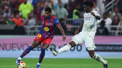 JEDDAH, SAUDI ARABIA - JANUARY 11: Marcus Rashford of FC Barcelona is challenged by Aurelien Tchouameni of Real Madrid during the Spanish Super Cup Final between FC Barcelona and Real Madrid at King Abdullah Sports City Hall Stadium on January 11, 2026 in Jeddah, Saudi Arabia. (Photo by Yasser Bakhsh/Getty Images)