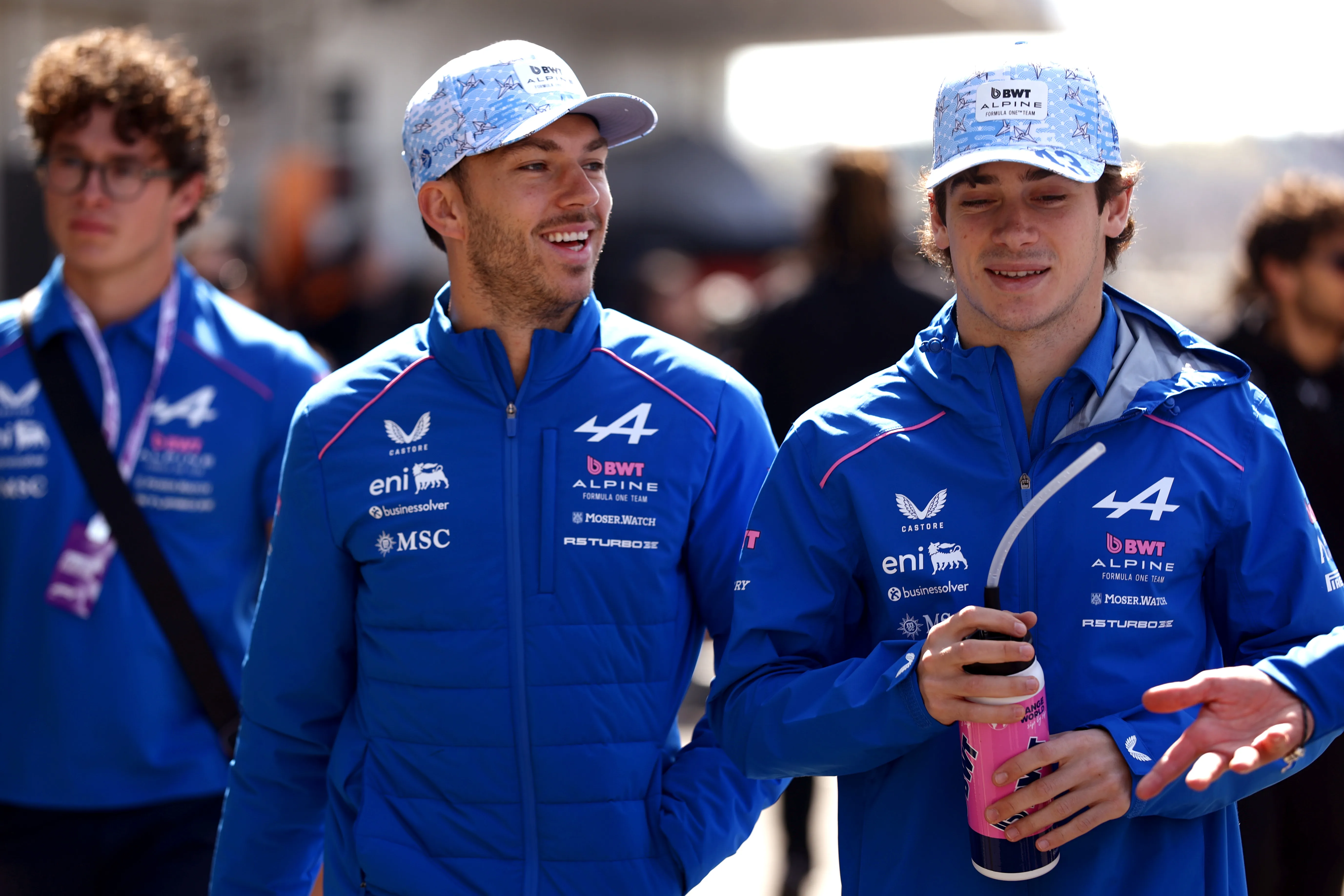 SUZUKA, JAPAN – MARCH 27: Pierre Gasly of France and Alpine F1 and Franco Colapinto of Argentina and Alpine F1 walk in the Paddock prior to practice ahead of the F1 Grand Prix of Japan at Suzuka Circuit on March 27, 2026 in Suzuka, Japan. (Photo by Mark Thompson/Getty Images)