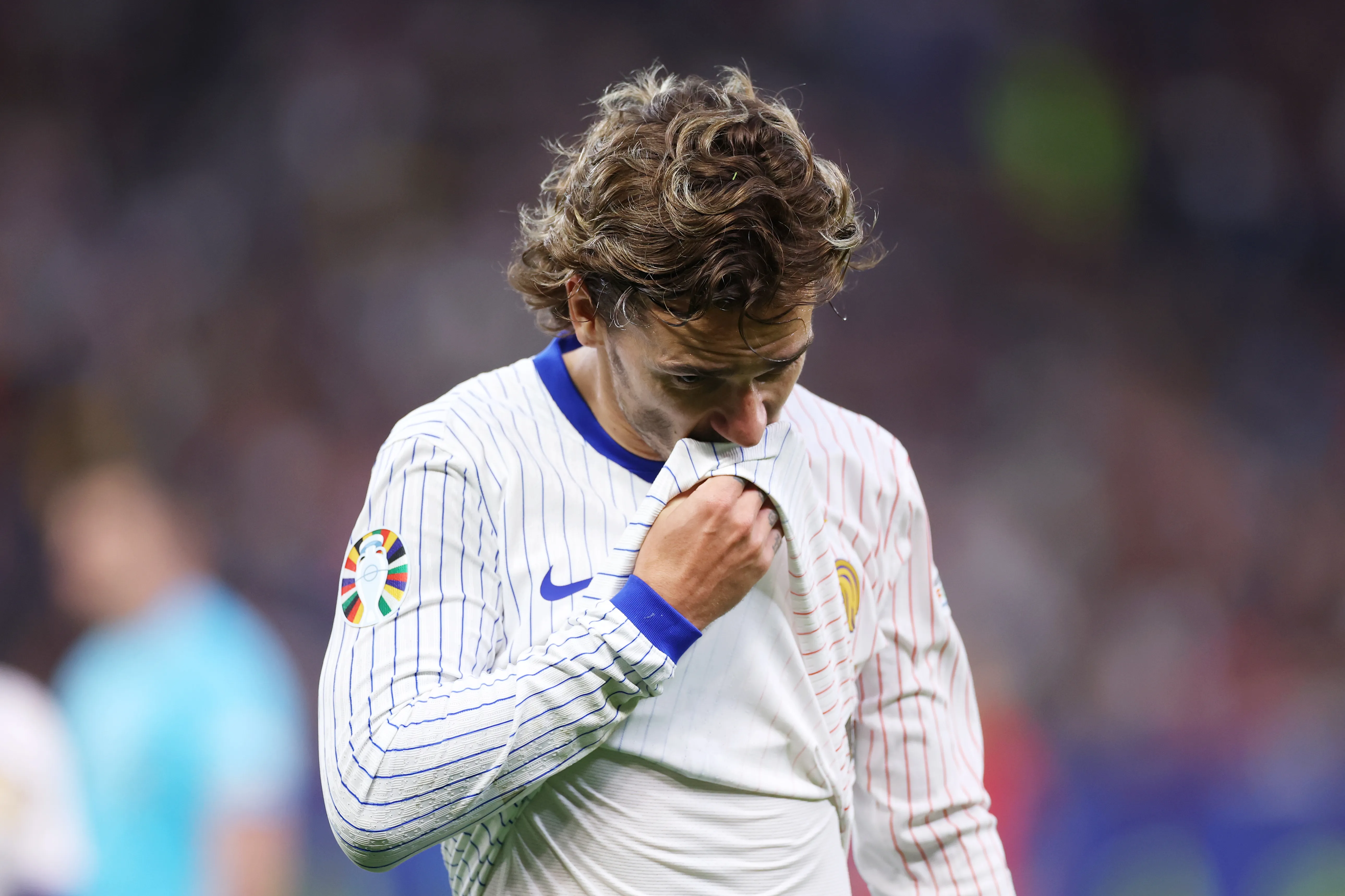 HAMBURG, GERMANY – JULY 05: Antoine Griezmann of France reacts during the UEFA EURO 2024 quarter-final match between Portugal and France at Volksparkstadion on July 05, 2024 in Hamburg, Germany. (Photo by Lars Baron/Getty Images)