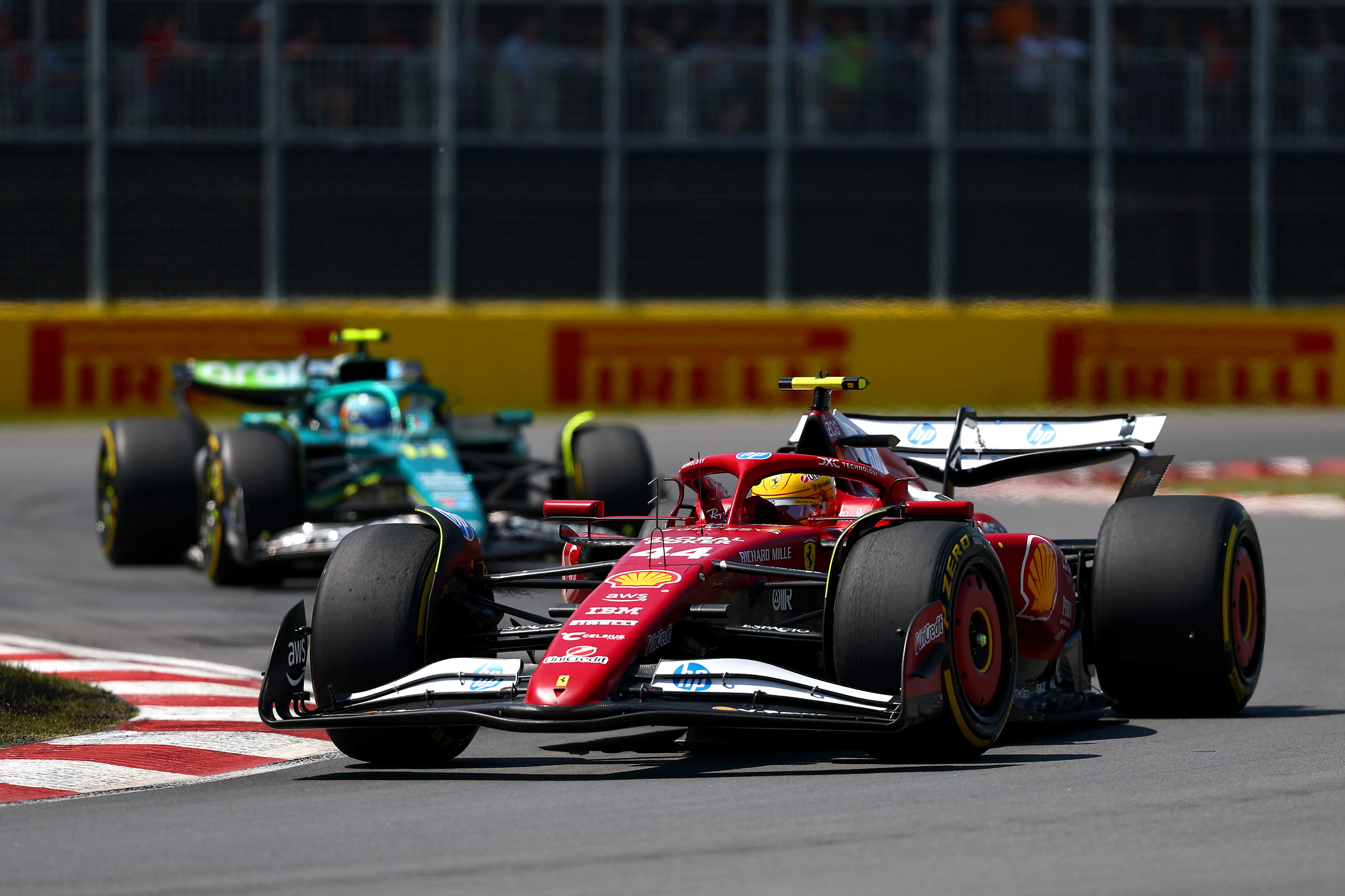 MONTREAL, QUEBEC – JUNE 15: Lewis Hamilton of Great Britain driving the (44) Scuderia Ferrari SF-25 leads Fernando Alonso of Spain driving the (14) Aston Martin F1 Team AMR25 Mercedes on track during the F1 Grand Prix of Canada at Circuit Gilles-Villeneuve on June 15, 2025 in Montreal, Quebec. (Photo by Clive Rose/Getty Images)