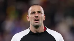 Goleiro em ação durante partida contra a Austrália