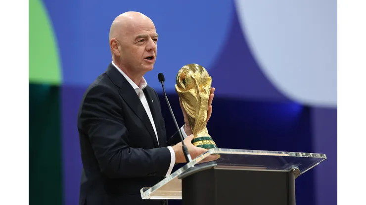 DALLAS, TEXAS - JUNE 01: FIFA President Gianni Infantino holds the FIFA World Cup winner's trophy while speaking during the FIFA World Cup 2026 International Broadcast Center Grand Opening ceremony on June 01, 2026 in Dallas, Texas. (Photo by Sam Hodde/Getty Images)