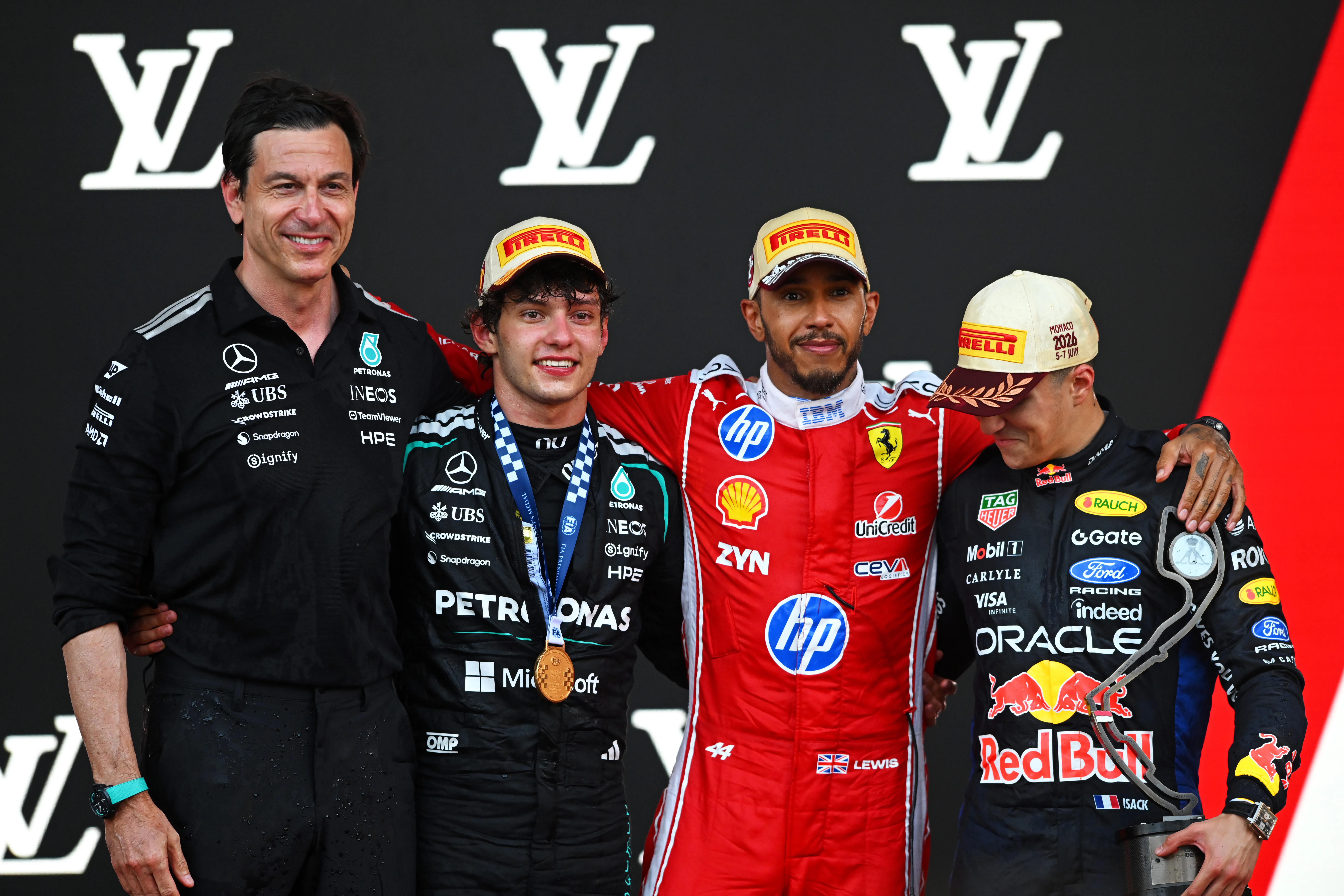 MONTE-CARLO, MONACO – JUNE 07: Race winner Andrea Kimi Antonelli of Italy and Mercedes AMG Petronas F1 Team Second placed Lewis Hamilton of Great Britain and Scuderia Ferrari Third placed Isack Hadjar of France and Oracle Red Bull Racing and Toto Wolff, Executive Director of Mercedes AMG Petronas F1 Team on the podium during the F1 Grand Prix of Monaco at Circuit de Monaco on June 07, 2026 in Monte-Carlo, Monaco. (Photo by Rudy Carezzevoli/Getty Images)