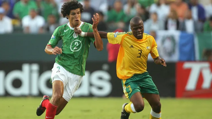 CARSON, CA - JULY 8: Francisco Rodriguez #2 of Mexico challenges Siboniso Gaxa #3 of South Africa for the ball during the CONCACAF Gold Cup 2005 at the Home Depot Center on July 8, 2005 in Carson, California. South Africa won 2-1. (Photo by Harry How/Getty Images)