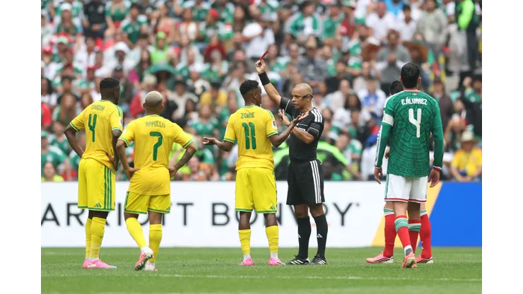 MEXICO CITY, MEXICO - JUNE 11: Referee Wilton Sampaio issues a red card to Themba Zwane #11 of South Africa during the FIFA World Cup 2026 Group A match between Mexico and South Africa at Mexico City Stadium on June 11, 2026 in Mexico City, Mexico. (Photo by Carl Recine/Getty Images)