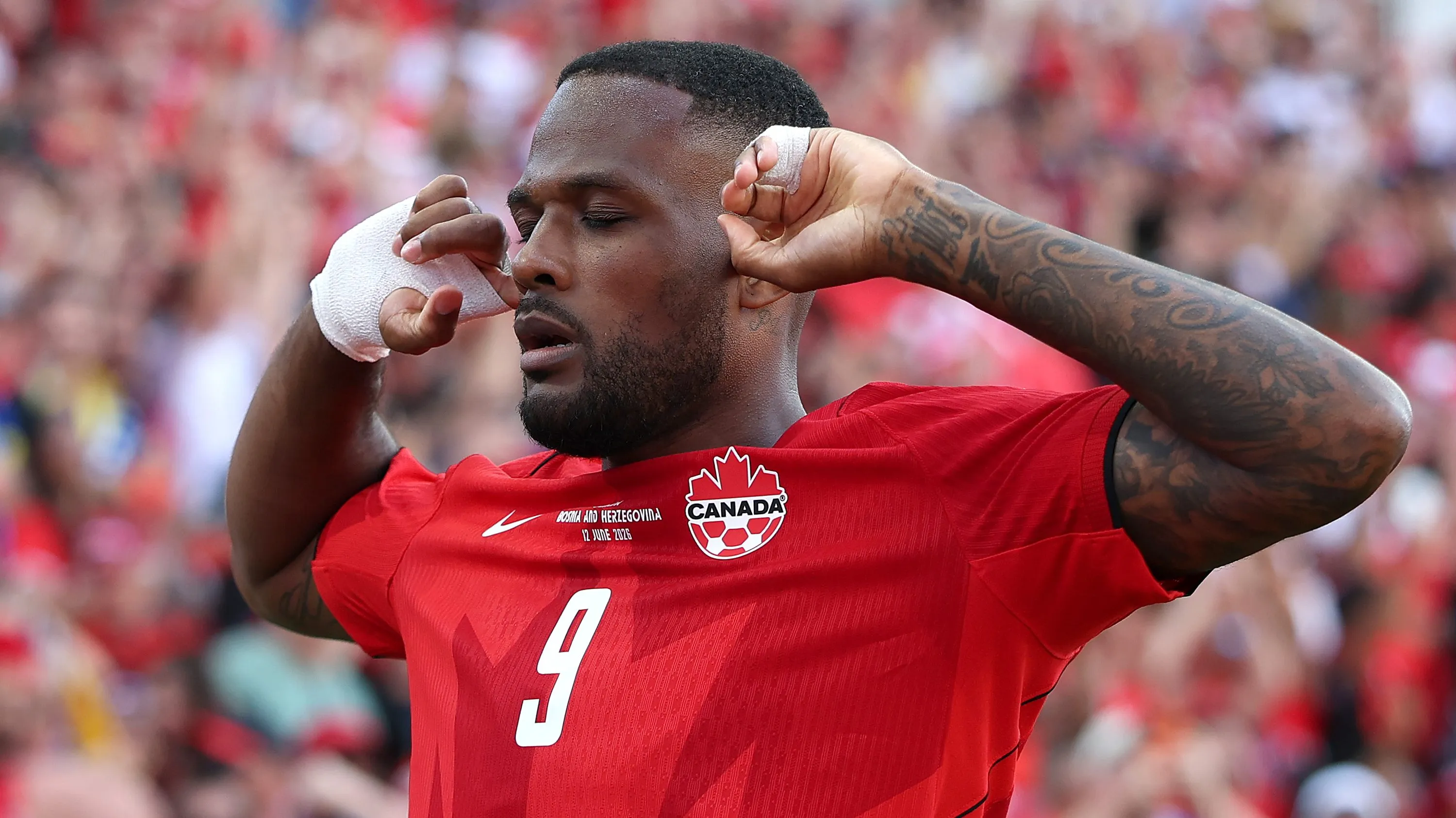 TORONTO, ONTARIO – JUNE 12: Cyle Larin #9 of Canada celebrates scoring his team’s first goal during the FIFA World Cup 2026 Group B match between Canada and Bosnia and Herzegovina at Toronto Stadium on June 12, 2026 in Toronto, Ontario. (Photo by Charlotte Wilson/Getty Images)