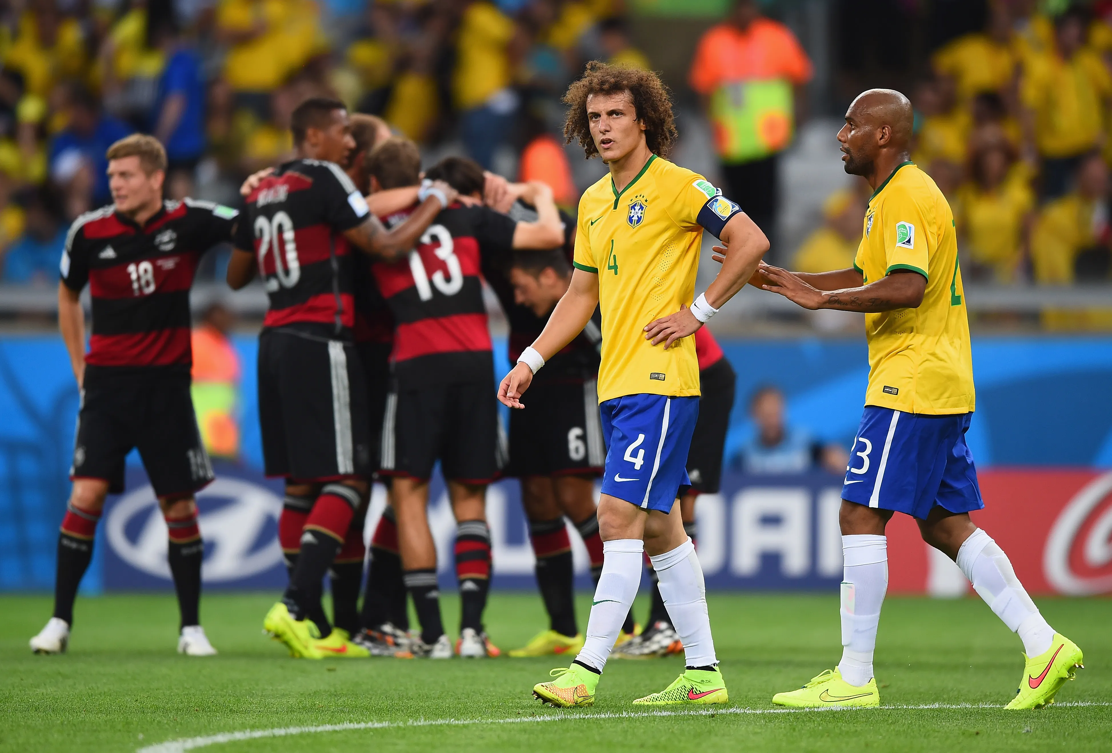 BELO HORIZONTE, BRAZIL – JULY 08:  David Luiz and Maicon of Brazil react after allowing a goal during the 2014 FIFA World Cup Brazil Semi Final match between Brazil and Germany at Estadio Mineirao on July 8, 2014 in Belo Horizonte, Brazil.  (Photo by Laurence Griffiths/Getty Images)