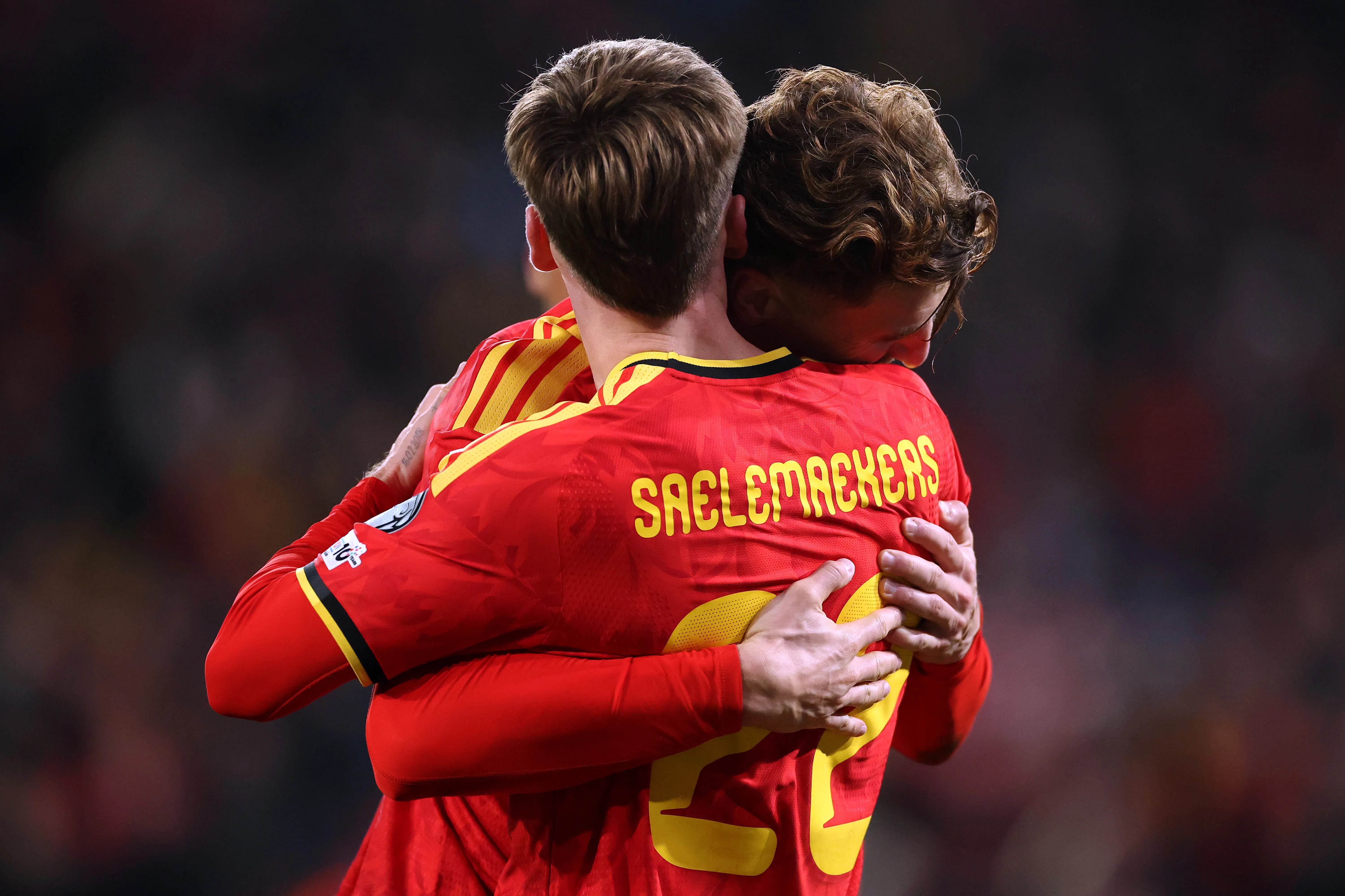 BRUSSELS, BELGIUM – NOVEMBER 18: Alexis Saelemaekers of Belgium celebrates scoring his teams first goal of the game with teammate Thomas Meunier during the FIFA World Cup 2026 qualifier match between Belgium and Liechtenstein at  on November 18, 2025 in Brussels, Belgium. (Photo by Dean Mouhtaropoulos/Getty Images)