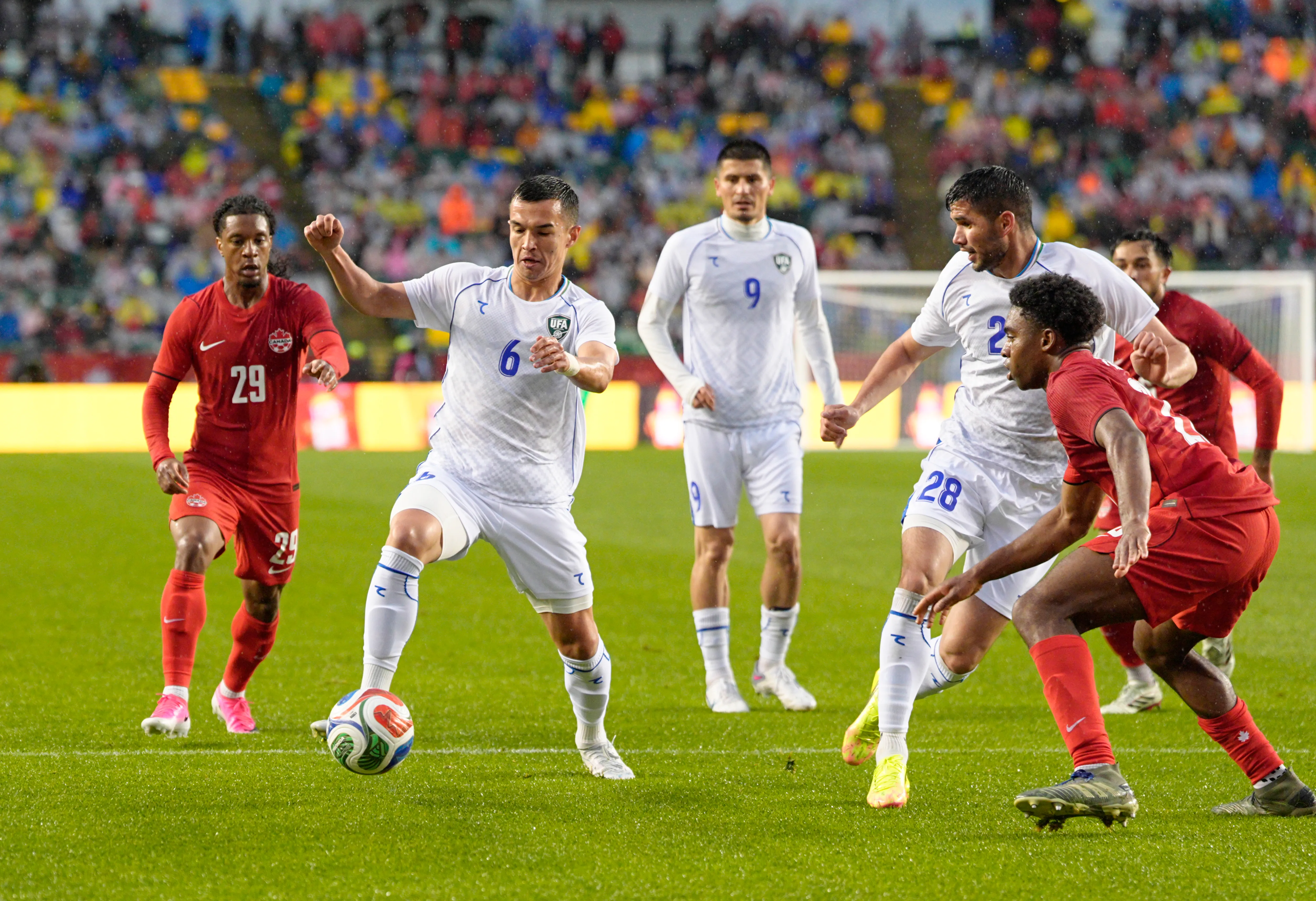 EDMONTON, CANADA – JUNE 1: Akmal Mozgovoy #6 of Uzbekistan runs up field during the international friendly match against Canada at Commonwealth Stadium on June 1, 2026 in Edmonton, Canada. (Photo by Jeff Vinnick/Getty Images)