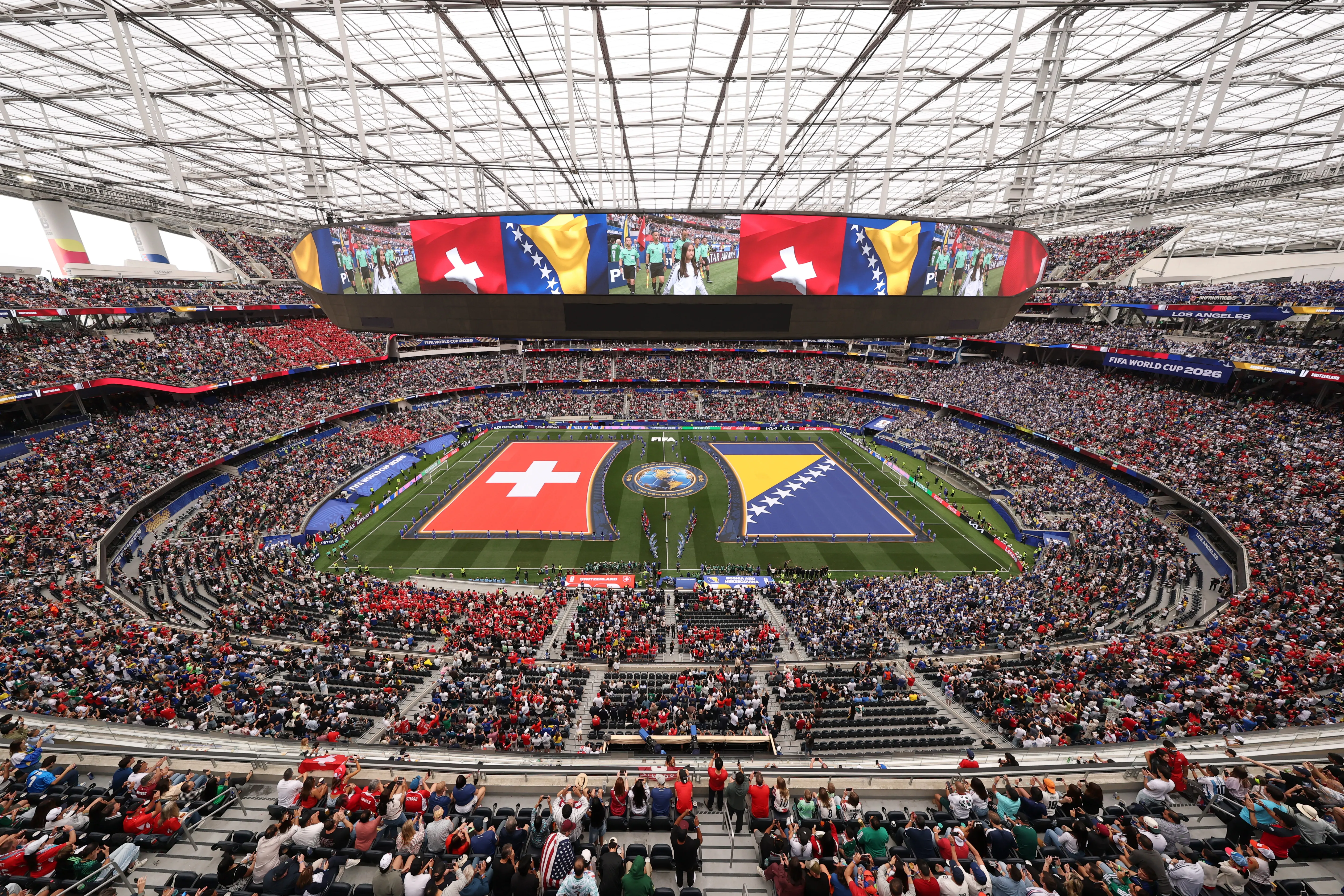 INGLEWOOD, CALIFORNIA – JUNE 18: Players line up before the FIFA World Cup 2026 Group B match between Switzerland and Bosnia and Herzegovina at Los Angeles Stadium on June 18, 2026 in Inglewood, California. (Photo by Richard Heathcote/Getty Images)