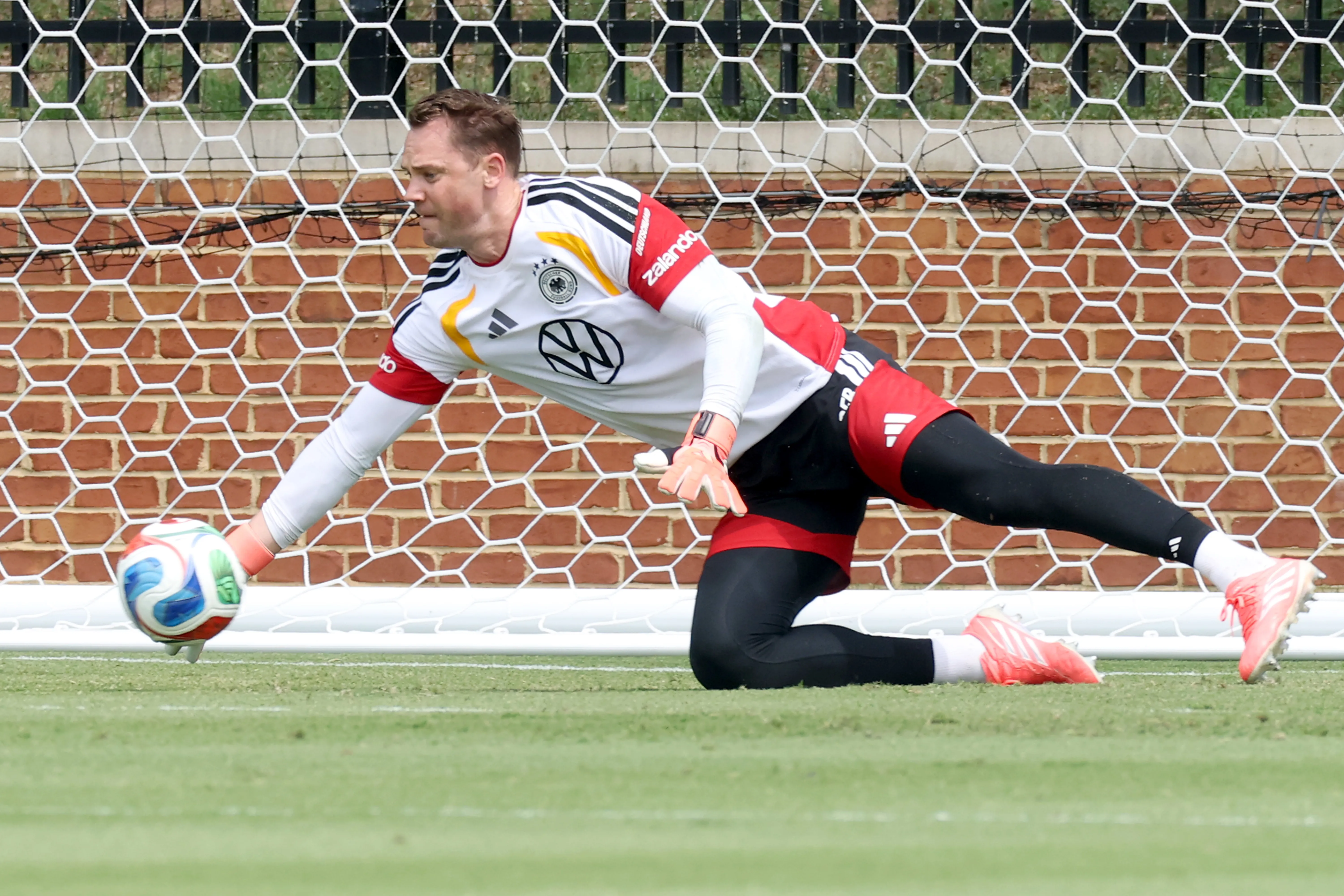 WINSTON-SALEM, NORTH CAROLINA – JUNE 18: Manuel Neuer of Germany, safes the ball during a Germany training session at Winston-Salem State University on June 18, 2026 in Winston-Salem, North Carolina. (Photo by Alexander Hassenstein/Getty Images)