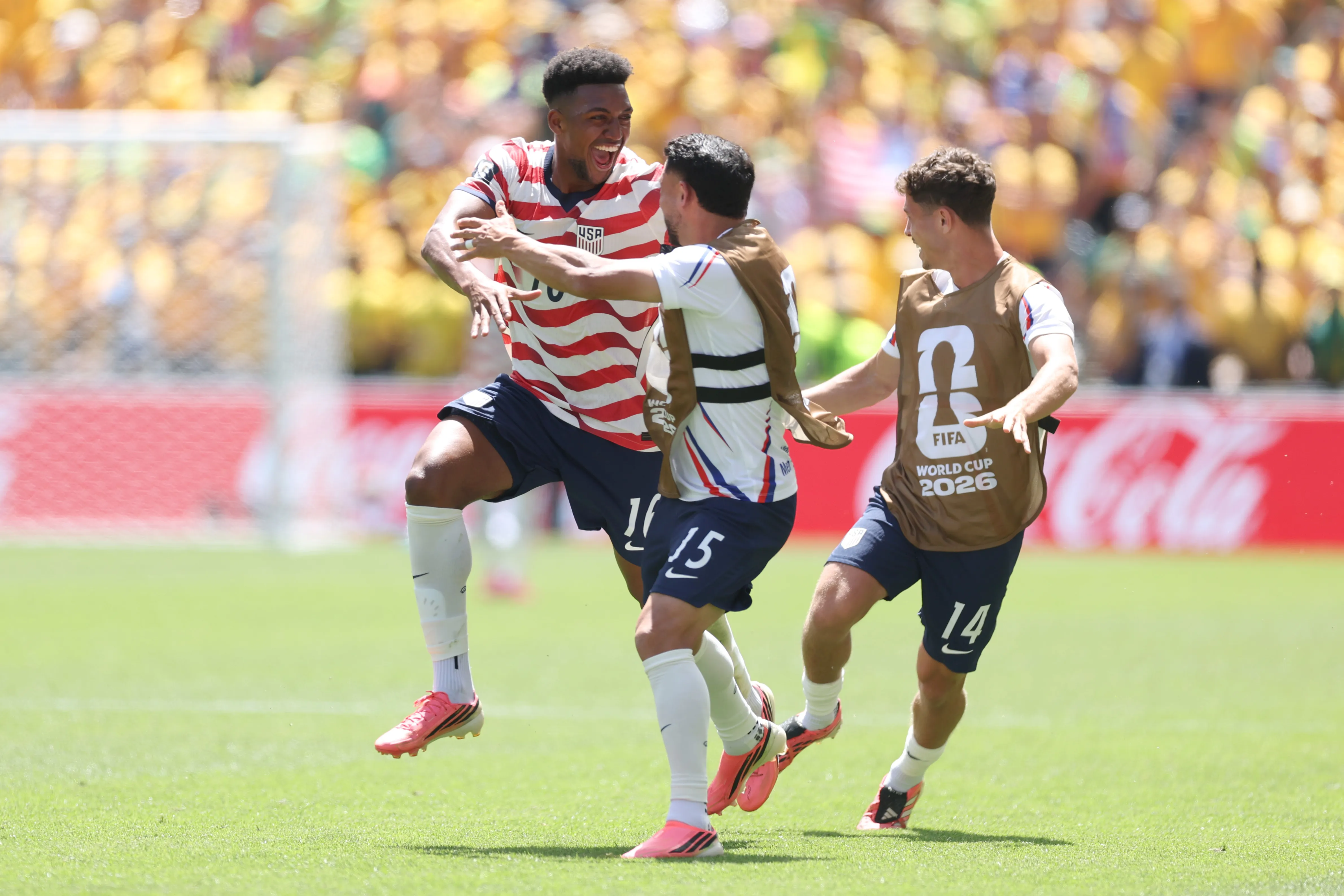 SEATTLE, WASHINGTON – JUNE 19: Alex Freeman #16 of the United States celebrates with teammate Cristian Roldan #15 after scoring his team’s second goal during the FIFA World Cup 2026 Group D match between USA and Australia at Seattle Stadium on June 19, 2026 in Seattle, Washington. (Photo by Jamie Squire/Getty Images)