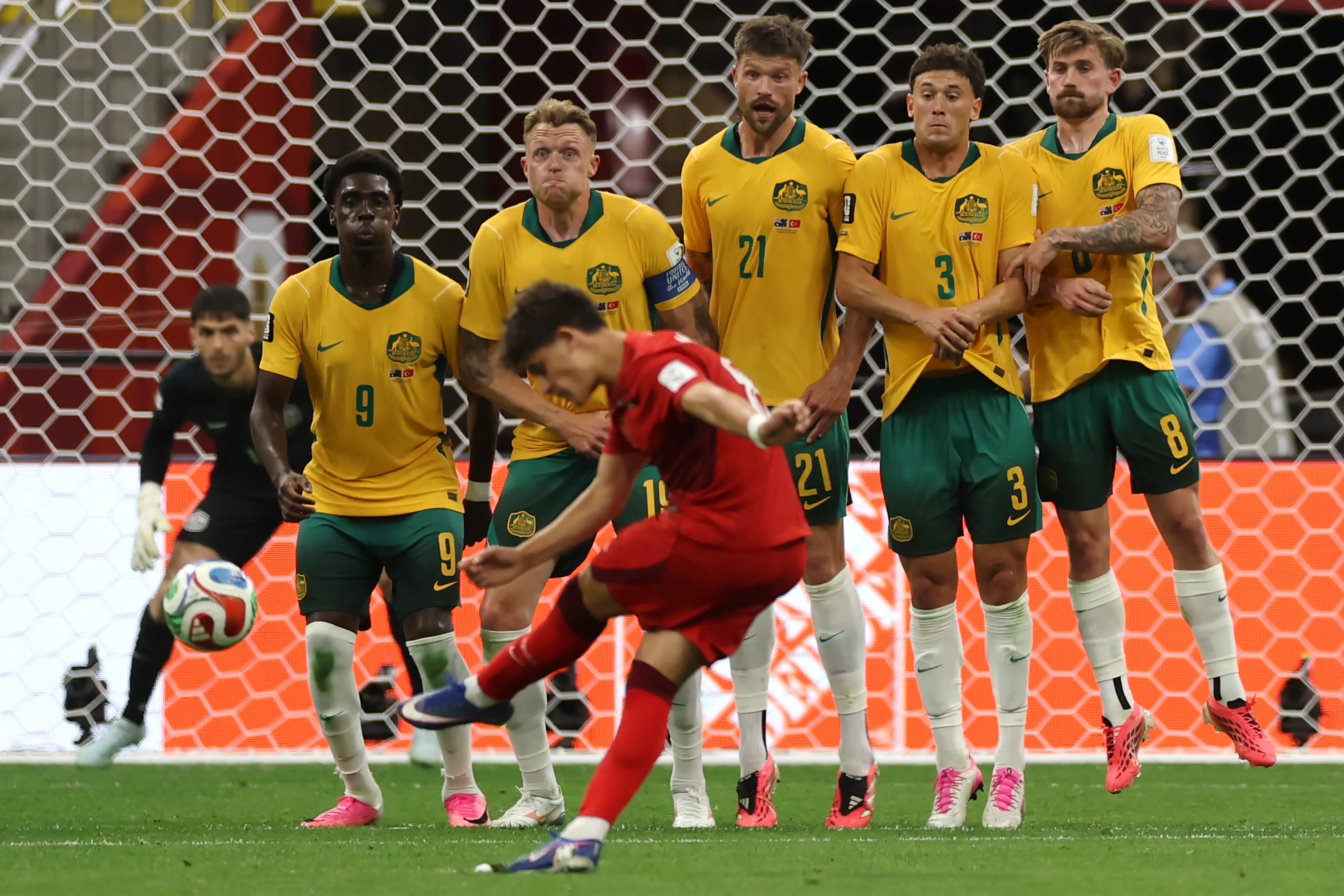 VANCOUVER, BRITISH COLUMBIA – JUNE 13: Arda Guler of Turkiye takes a free kick on goal as Mohamed Toure, Harry Souttar, Cameron Burgess, Alessandro Circati and Connor Metcalfe of Australia jump in the defensive wall during the FIFA World Cup 2026 Group D match between Australia and Türkiye at BC Place Vancouver on June 13, 2026 in Vancouver, British Columbia. (Photo by Dean Mouhtaropoulos/Getty Images)