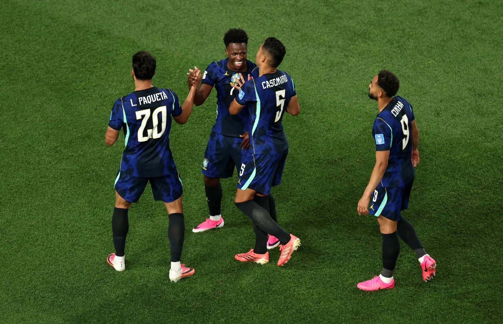 PHILADELPHIA, PENNSYLVANIA – JUNE 19: Vinicius Junior #7 of Brazil celebrates scoring his team’s third goal with Lucas Paqueta #20 and Casemiro #5 during the FIFA World Cup 2026 Group C match between Brazil and Haiti at Philadelphia Stadium on June 19, 2026 in Philadelphia, Pennsylvania. (Photo by Kevin C. Cox/Getty Images)