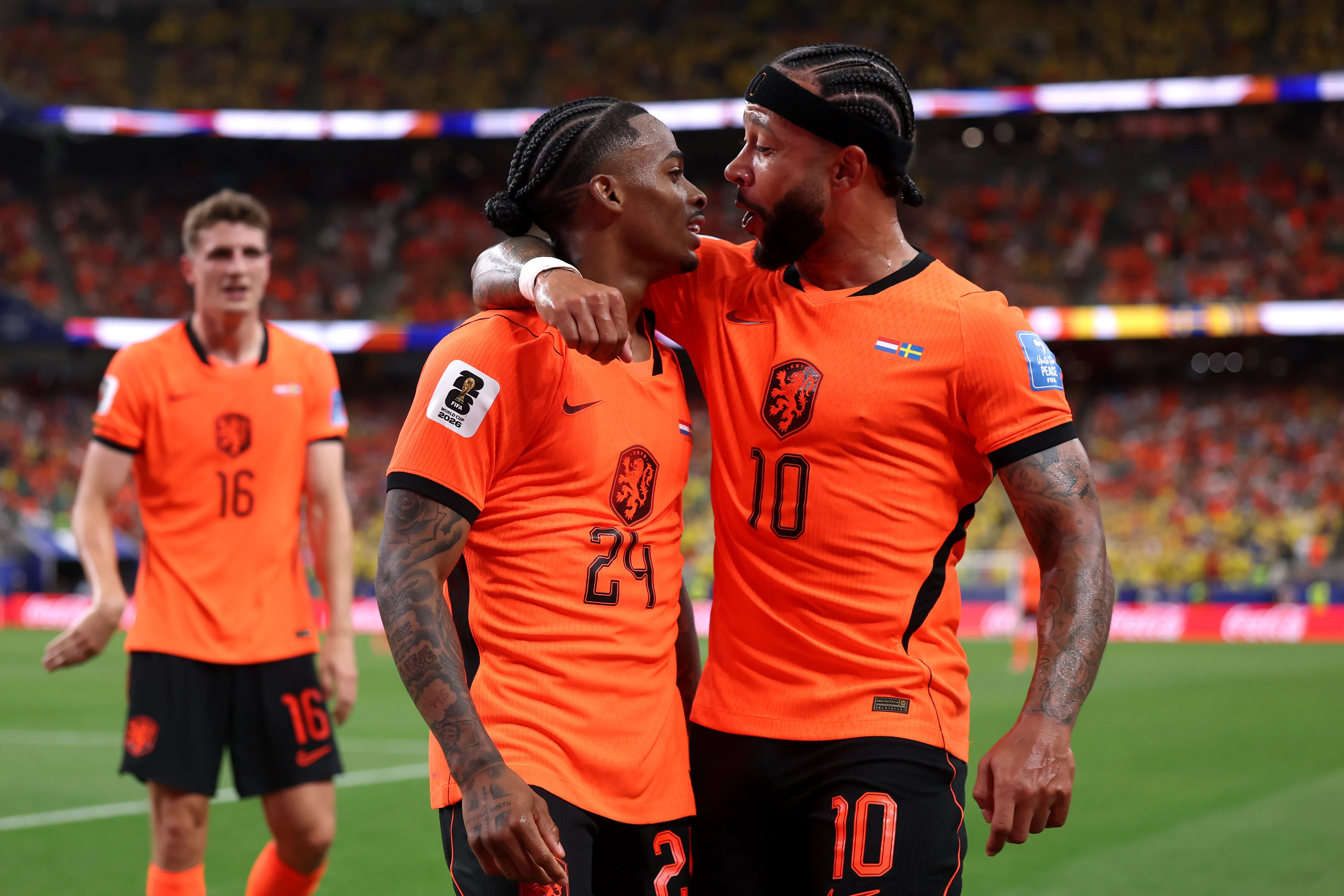 HOUSTON, TEXAS – JUNE 20: Crysencio Summerville #24 of the Netherlands celebrates with teammate Memphis Depay #10 after scoring his team’s fifth goal during the FIFA World Cup 2026 Group F match between Netherlands and Sweden at Houston Stadium on June 20, 2026 in Houston, Texas. (Photo by Lars Baron/Getty Images)