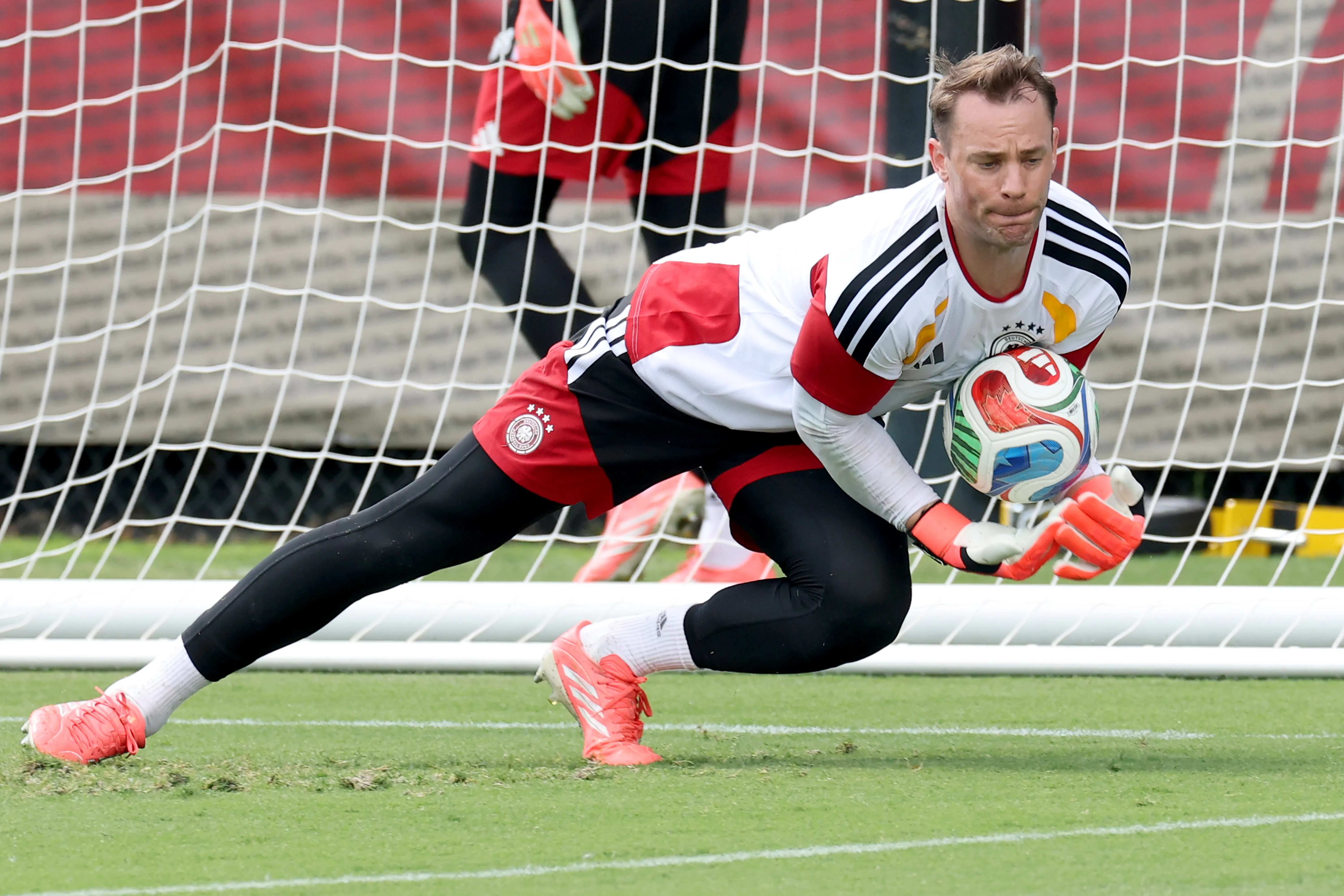 WINSTON-SALEM, NORTH CAROLINA – JUNE 13: Manuel Neuer of Germany safes the ball during the training session of Germany at W. Dennie Spry Soccer Stadium one day ahead of the FIFA World Cup 2026 Group E match between Germany and Curacao at Houston Stadium on June 13, 2026 in Winston-Salem, North Carolina. (Photo by Alexander Hassenstein/Getty Images)