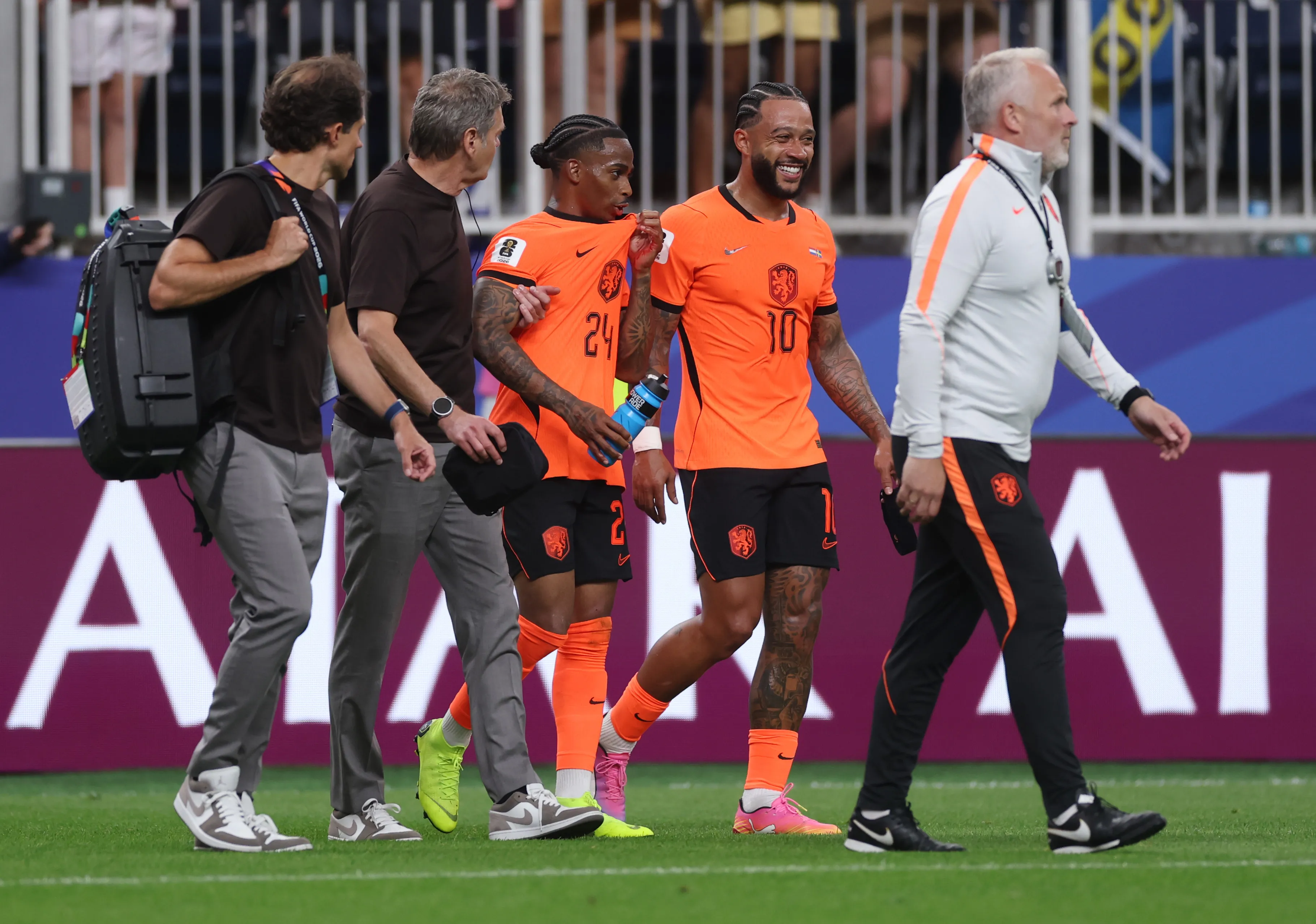 HOUSTON, TEXAS – JUNE 20: Crysencio Summerville #24 and Memphis Depay #10 of the Netherlands celebrate the team’s 5-1 victory in the FIFA World Cup 2026 Group F match between Netherlands and Sweden at Houston Stadium on June 20, 2026 in Houston, Texas. (Photo by Lars Baron/Getty Images)