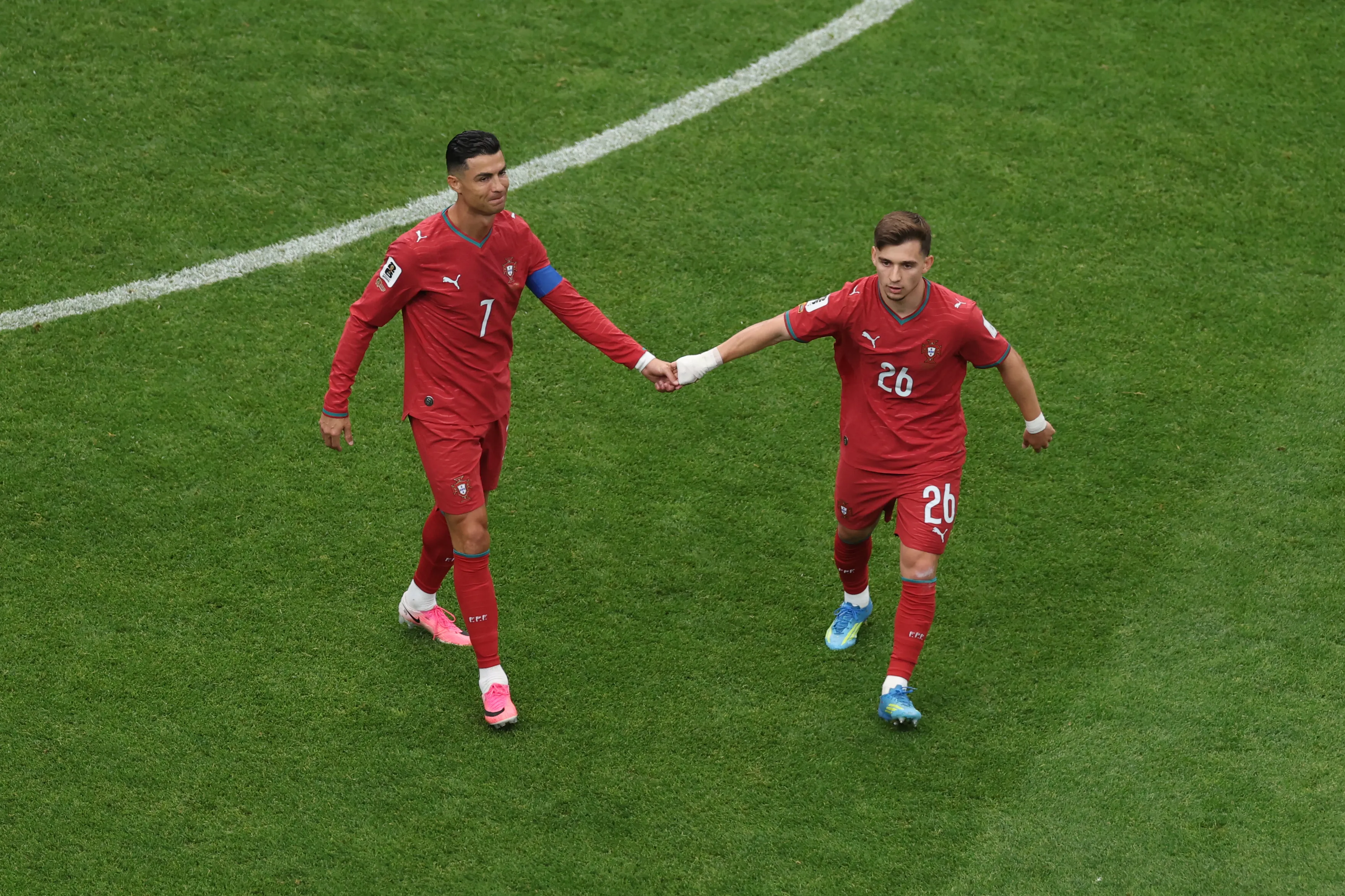 HOUSTON, TEXAS – JUNE 17: Cristiano Ronaldo #7 and Francisco Conceicao #26 of Portugal react during the FIFA World Cup 2026 Group K match between Portugal and Congo DR at Houston Stadium on June 17, 2026 in Houston, Texas. (Photo by Lars Baron/Getty Images)