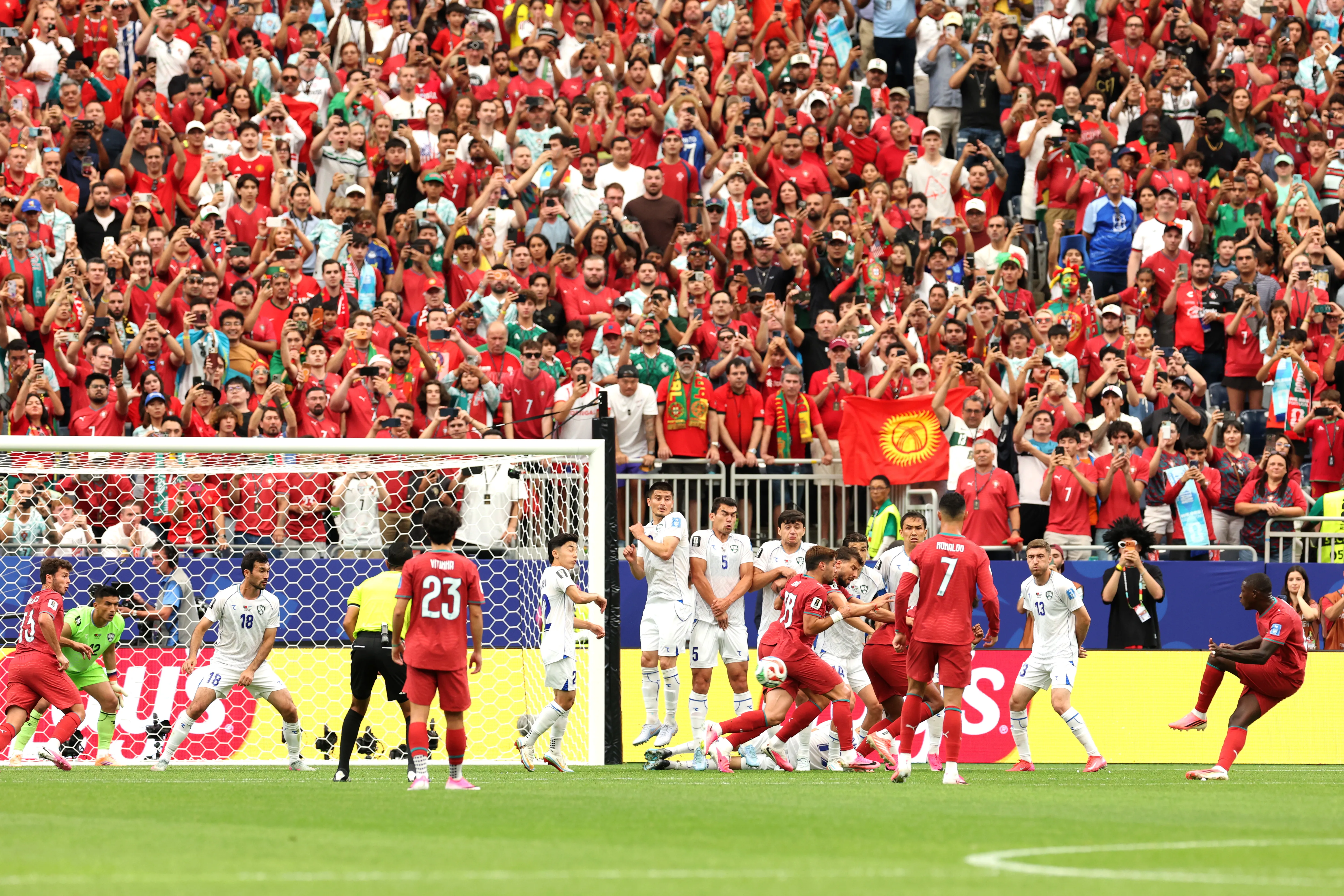 HOUSTON, TEXAS – JUNE 23: Nuno Mendes #25 of Portugal scores his team’s second goal from free kick during the FIFA World Cup 2026 Group K match between Portugal and Uzbekistan at Houston Stadium on June 23, 2026 in Houston, Texas. (Photo by Charlotte Wilson/Getty Images)