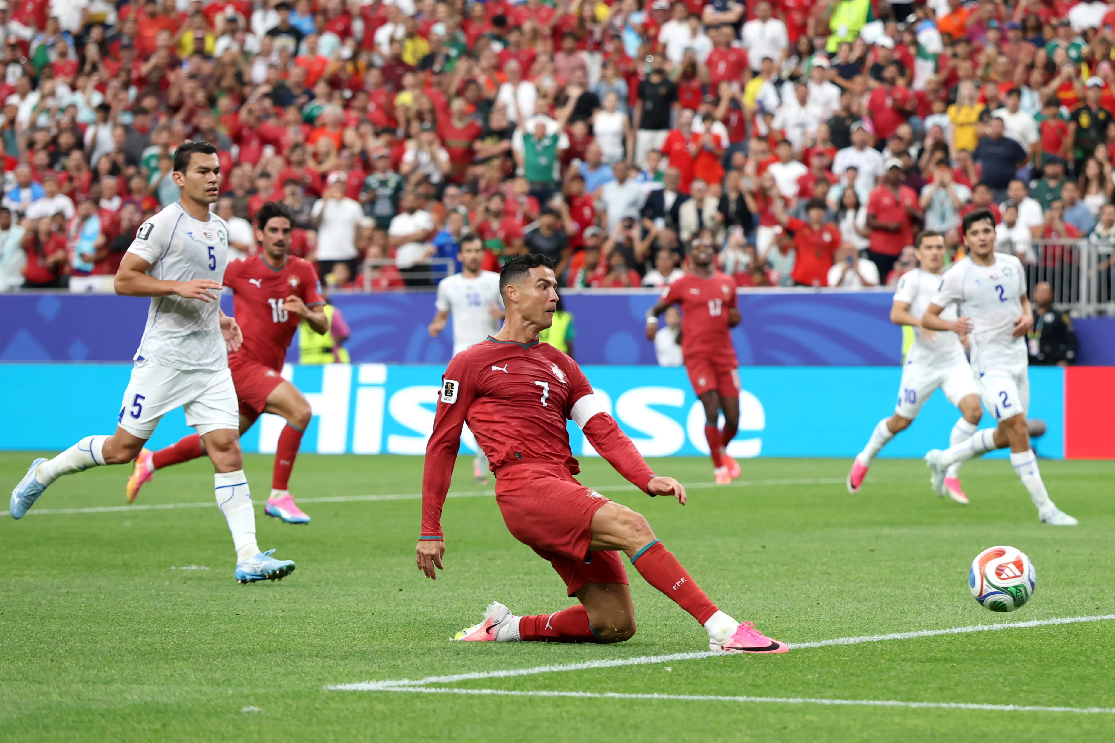 HOUSTON, TEXAS – JUNE 23: Cristiano Ronaldo #7 of Portugal dives for the ball during the FIFA World Cup 2026 Group K match between Portugal and Uzbekistan at Houston Stadium on June 23, 2026 in Houston, Texas. (Photo by Charlotte Wilson/Getty Images)
