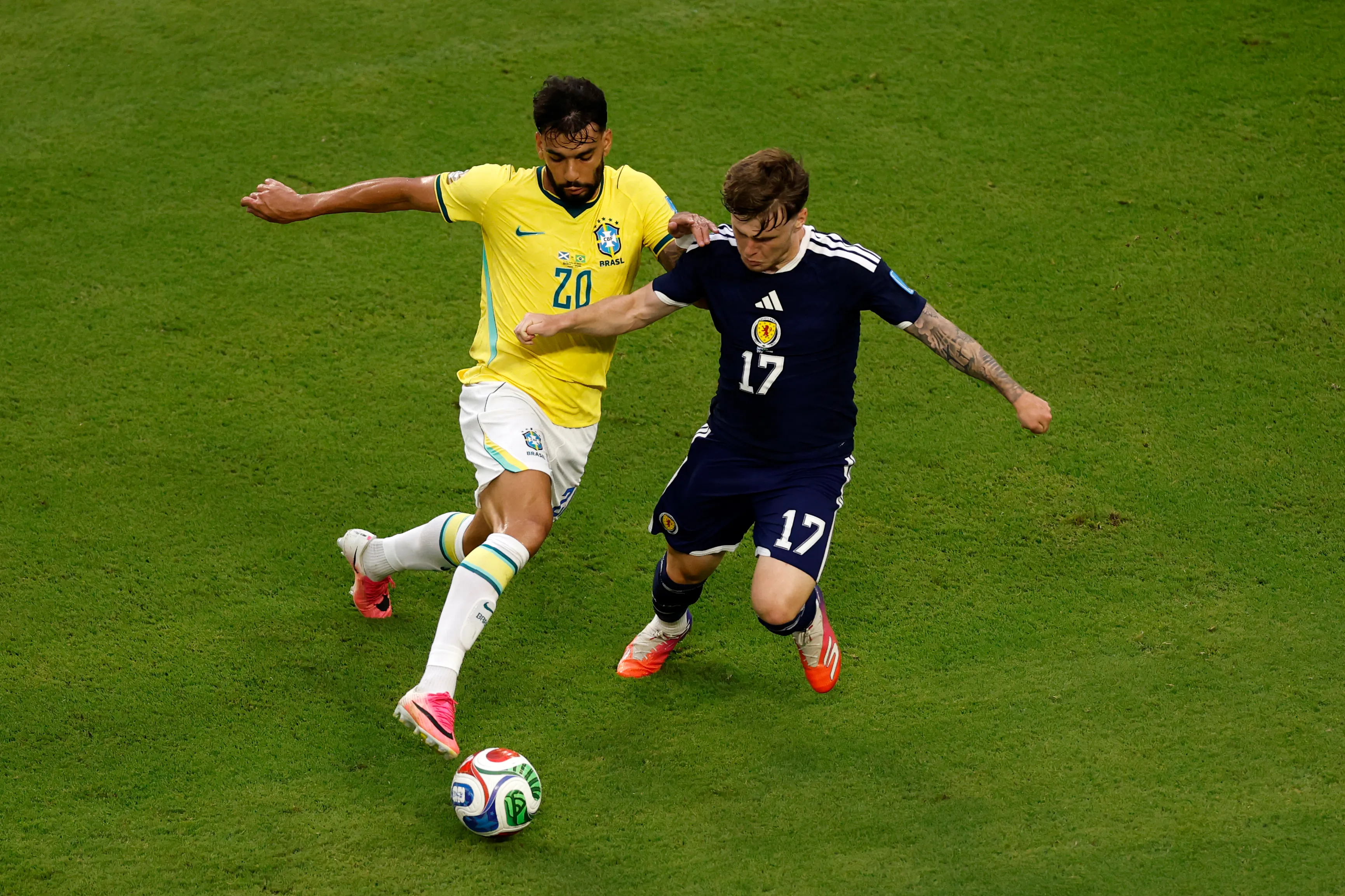 MIAMI GARDENS, FLORIDA – JUNE 24: Ben Gannon-Doak #17 of Scotland competes for the ball against Lucas Paqueta #20 of Brazil during the FIFA World Cup 2026 Group C match between Scotland and Brazil at Miami Stadium on June 24, 2026 in Miami Gardens, Florida. (Photo by Michael Reaves/Getty Images)