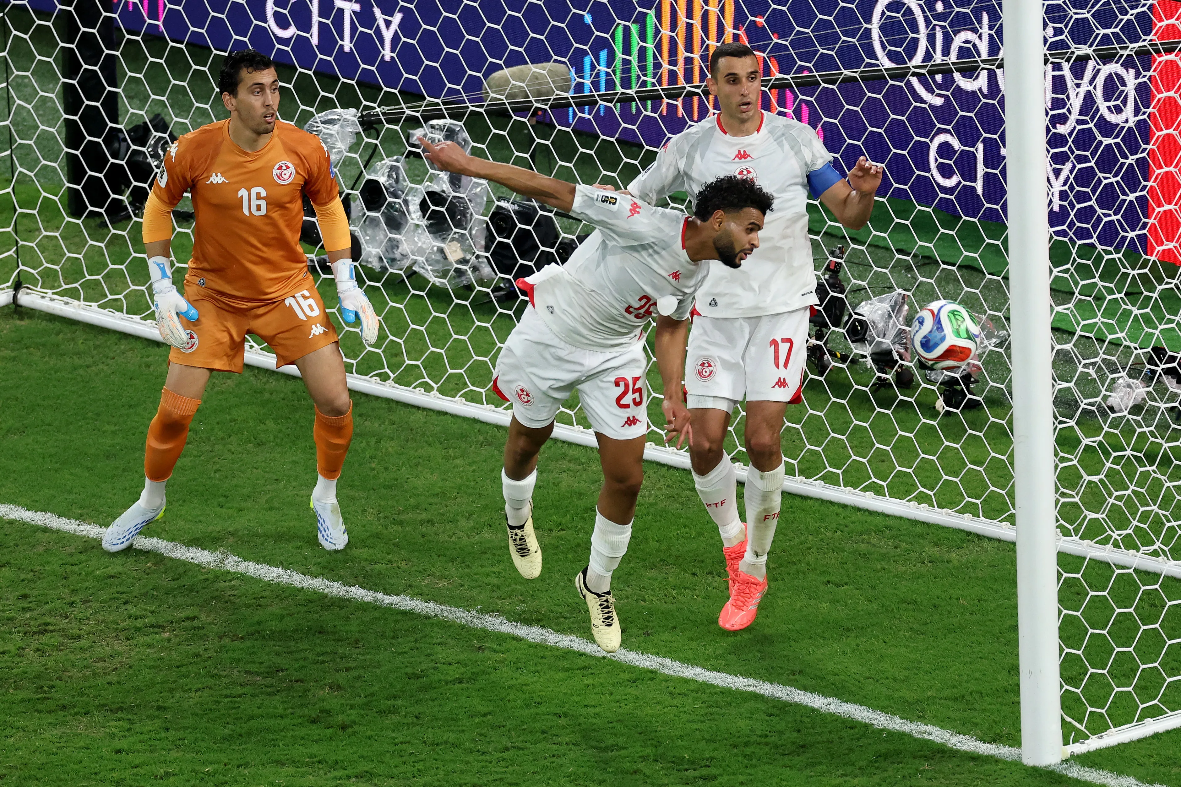 GUADALUPE, MEXICO – JUNE 20: Ayase Ueda #18 (not pictured) of Japan scores his team’s fourth goal past Aymen Dahmen #16, Anis Slimane #25 and Ellyes Skhiri #17 of Tunisia during the FIFA World Cup 2026 Group F match between Tunisia and Japan at Monterrey Stadium on June 20, 2026 in Guadalupe, Mexico. (Photo by Carl Recine/Getty Images)