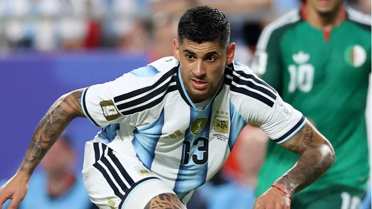 KANSAS CITY, MISSOURI - JUNE 16: Cristian Romero #13 of Argentina controls the ball against Rayan Ait-Nouri #15 of Algeria during the FIFA World Cup 2026 Group J match between Argentina and Algeria at Kansas City Stadium on June 16, 2026 in Kansas City, Missouri. (Photo by Michael Steele/Getty Images)