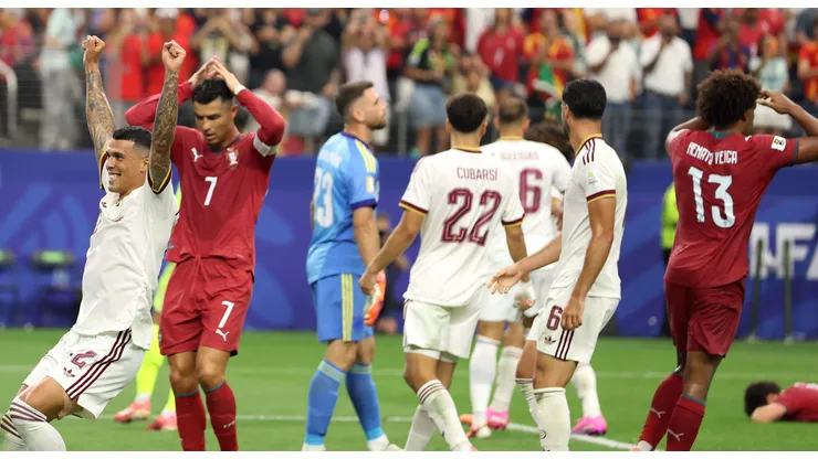 ARLINGTON, TEXAS - JULY 06: Pedro Porro #12 of Spain celebrates the 1-0 victory as Cristiano Ronaldo #7 of Portugal reacts during the FIFA World Cup 2026 Round of 16 match between Portugal and Spain at Dallas Stadium on July 06, 2026 in Arlington, Texas. (Photo by Florencia Tan Jun/Getty Images)