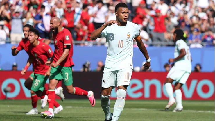 FOXBOROUGH, MASSACHUSETTS - JULY 09: Kylian Mbappe #10 of France reacts after failing to convert a penalty that was saved by Yassine Bounou #1 of Morocco during the FIFA World Cup 2026 Quarter Final match between France and Morocco at Boston Stadium on July 09, 2026 in Foxborough, Massachusetts. (Photo by Lars Baron/Getty Images)