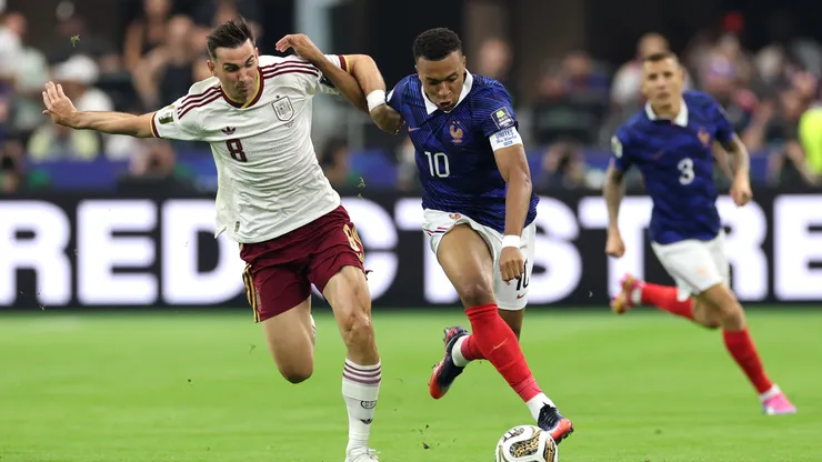 ARLINGTON, TEXAS - JULY 14: Kylian Mbappe #10 of France controls the ball against Fabian Ruiz #8 of Spain during the FIFA World Cup 2026 Semi Final match between France and Spain at Dallas Stadium on July 14, 2026 in Arlington, Texas. (Photo by Florencia Tan Jun/Getty Images)