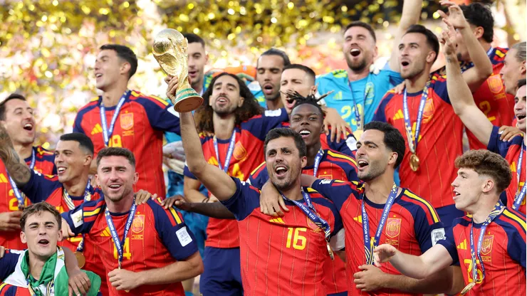 EAST RUTHERFORD, NEW JERSEY - JULY 19: Rodri #16 of Spain lifts the FIFA World Cup Winner’s Trophy after the team’s victory following the FIFA World Cup 2026 Final match between Spain and Argentina at New York New Jersey Stadium on July 19, 2026 in East Rutherford, New Jersey. (Photo by Carl Recine/Getty Images)