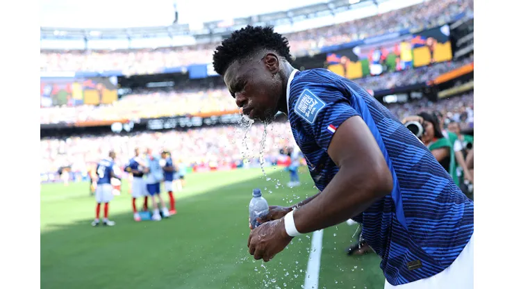 EAST RUTHERFORD, NEW JERSEY - JUNE 30: Aurelien Tchouameni #8 of France cools off before the FIFA World Cup 2026 Round Of 32 match between France and Sweden at New York New Jersey Stadium on June 30, 2026 in East Rutherford, New Jersey. (Photo by Dan Mullan/Getty Images)