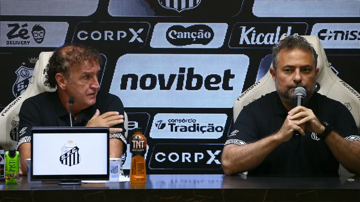 - Cuca ao lado de Alexandre Mattos.