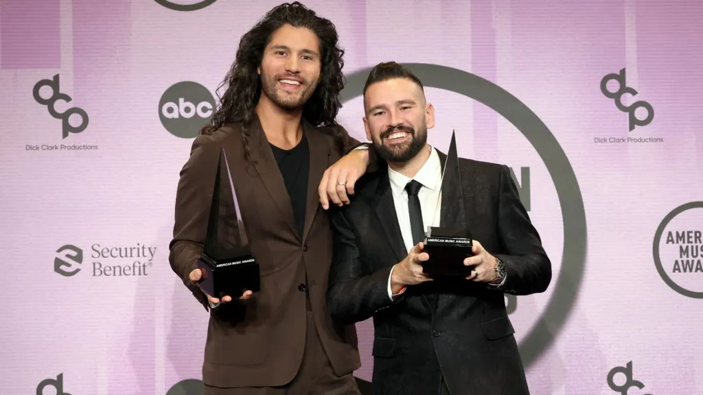 Dan Smyers and Shay Mooney of Dan + Shay, pose in the press room during the 2022 American Music Awards. (Source: Amy Sussman/Getty Images for dcp)