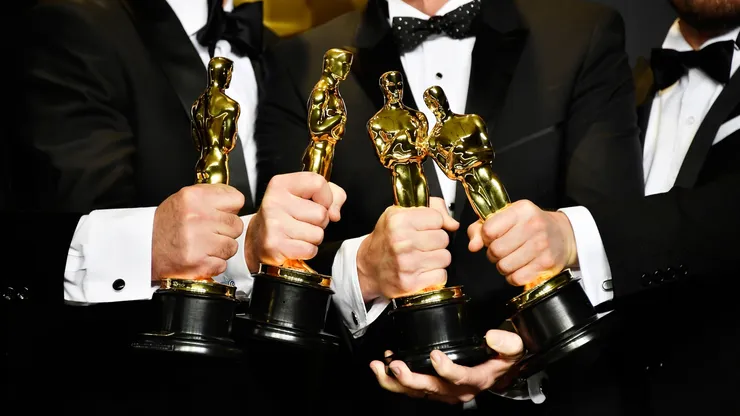 Sound mixers Peter Grace, Robert Mackenzie, Kevin O'Connell and Andy Wright pose in the press room during the 89th Annual Academy Awards.