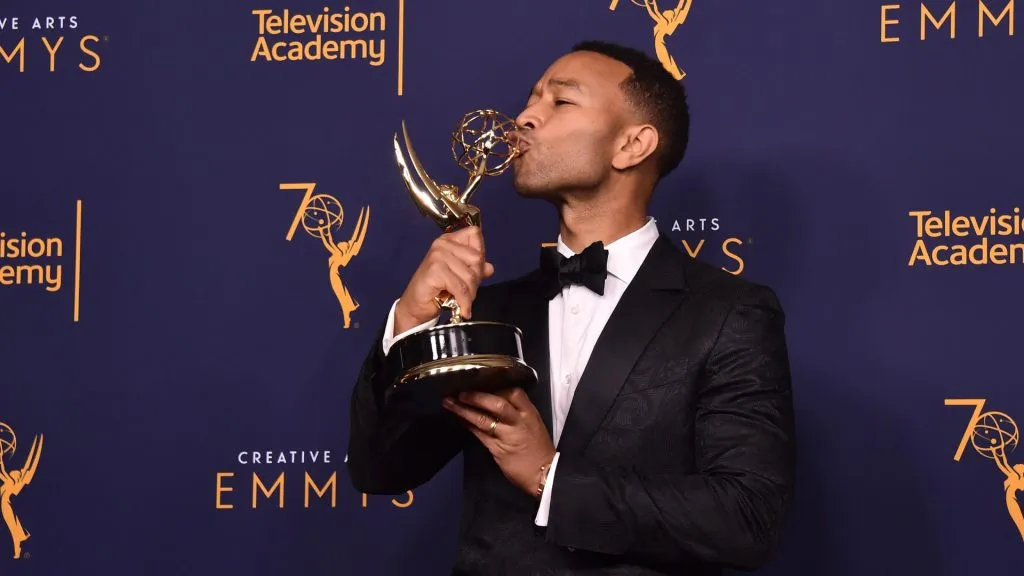 john legend kisses his emmy award